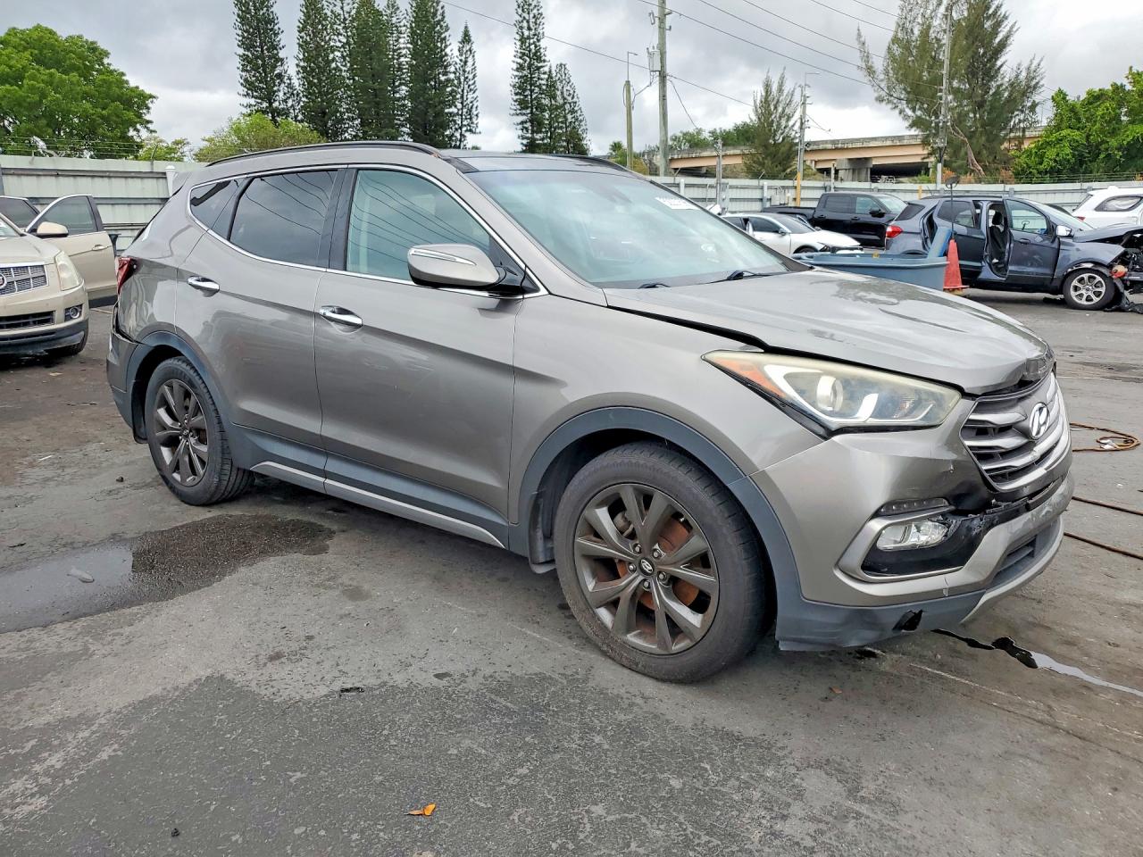 2017 Hyundai Santa Fe Sport 2.0t Ultimate Желто-коричневый vin: 5XYZW4LA2HG430524