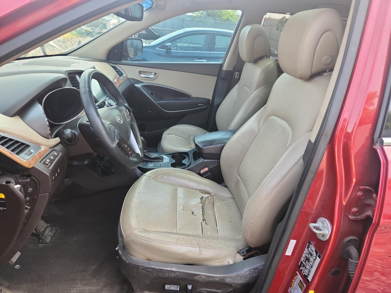 2013 Hyundai Santa Fe Sport 2.0t Maroon vin: 5XYZWDLA1DG065277 Damage: Left Front Seat Cushion, Torn, 9 To 10 Inches
