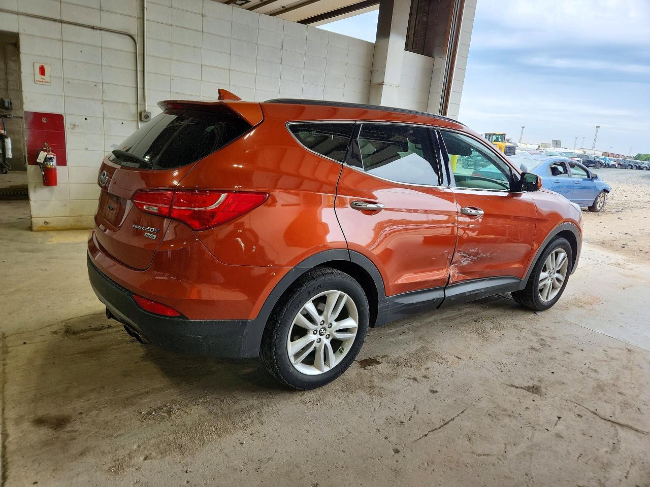 2014 Hyundai Santa Fe Sport 2.0t Оранжевый vin: 5XYZWDLA3EG231851