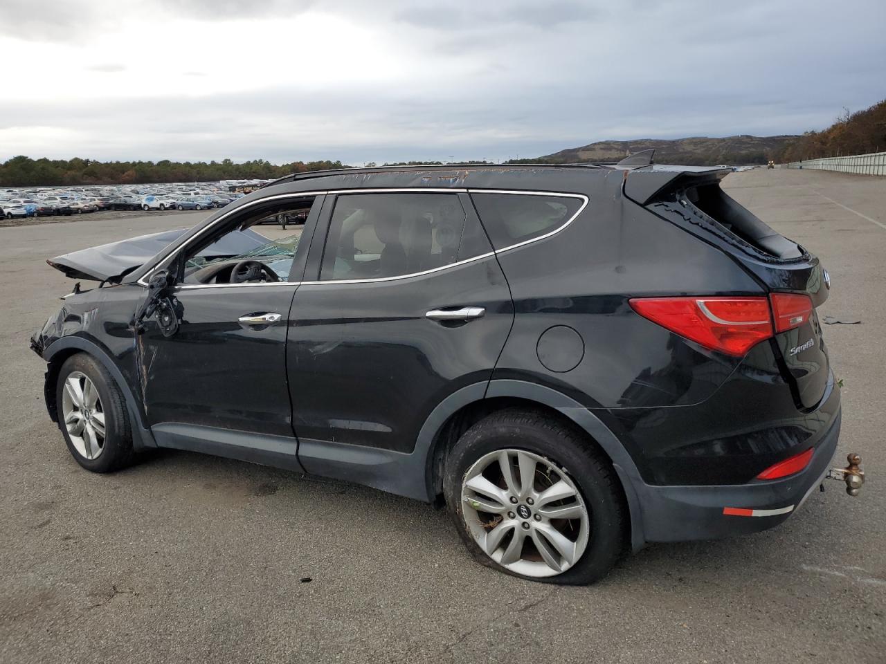 2015 Hyundai Santa Fe Sport Черный vin: 5XYZWDLA8FG243897