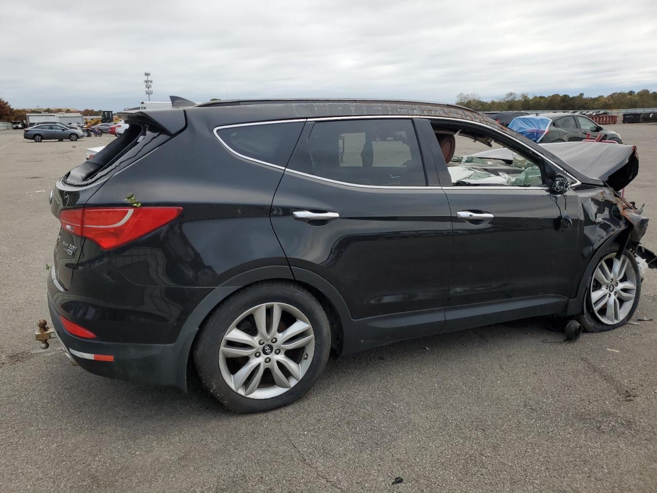 2015 Hyundai Santa Fe Sport Черный vin: 5XYZWDLA8FG243897