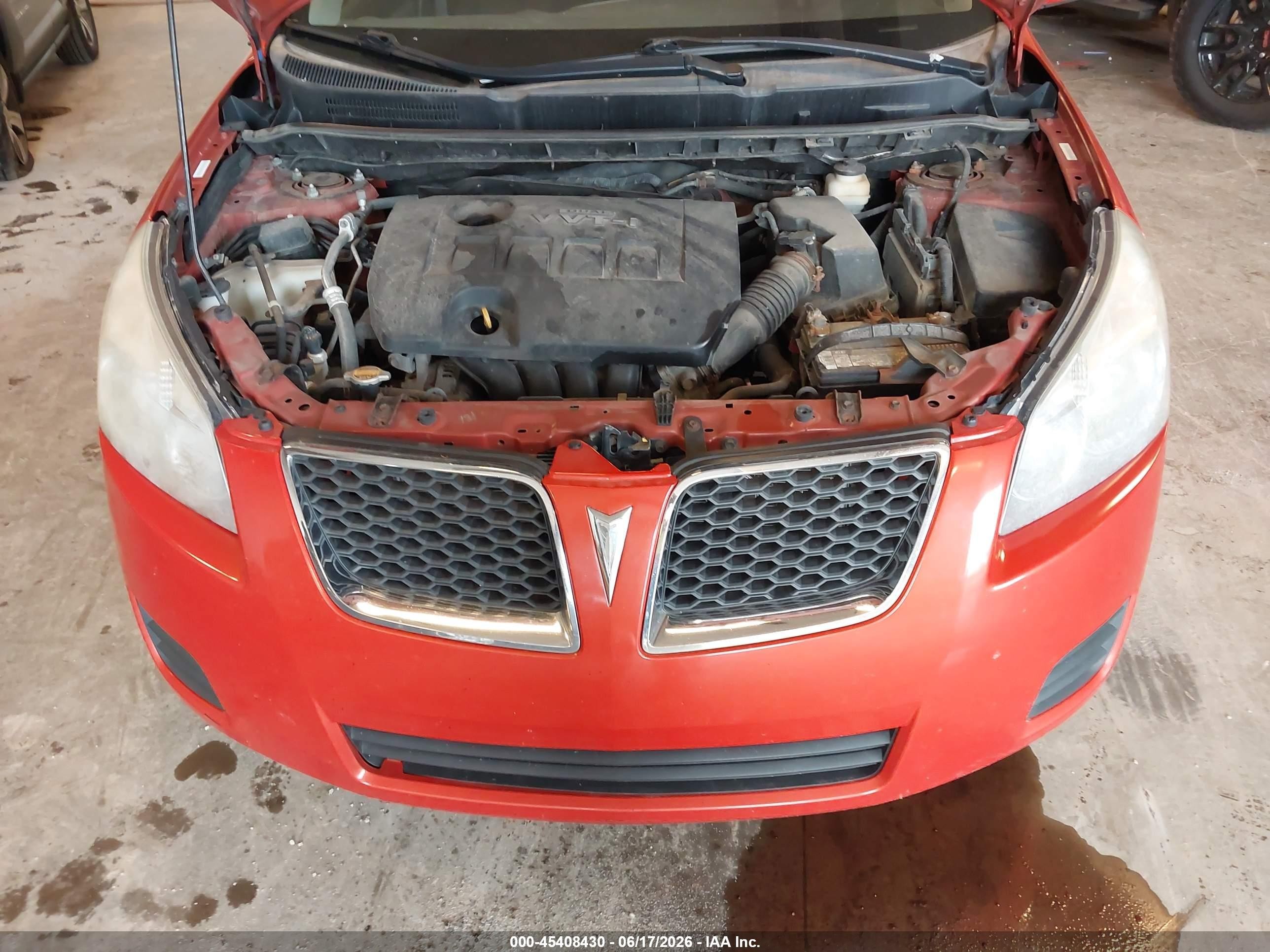 2010 Pontiac Vibe   Orange vin: 5Y2SP6E81AZ400183