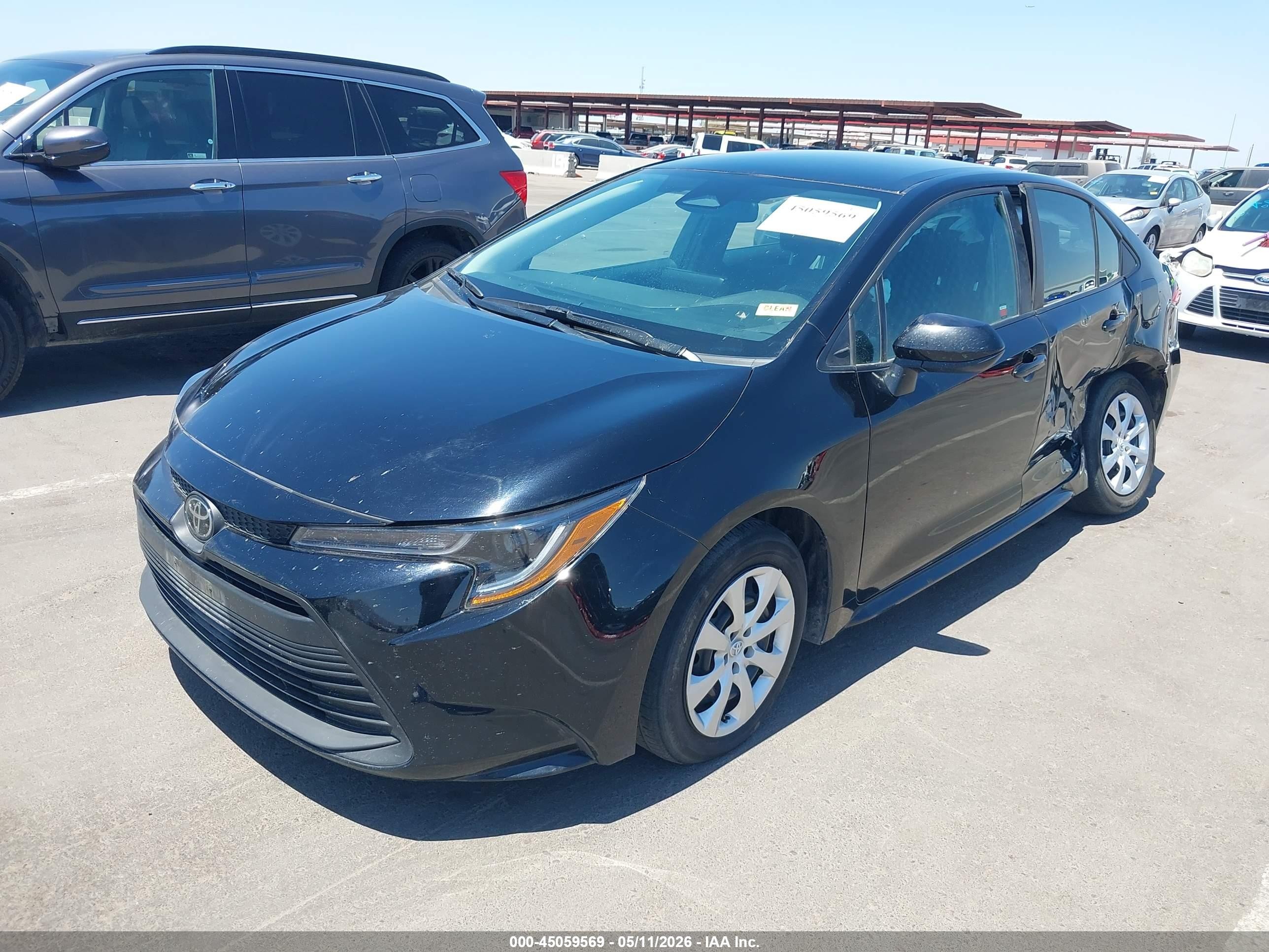 2025 Toyota Corolla Le Black vin: 5YFB4MDE3SP352539