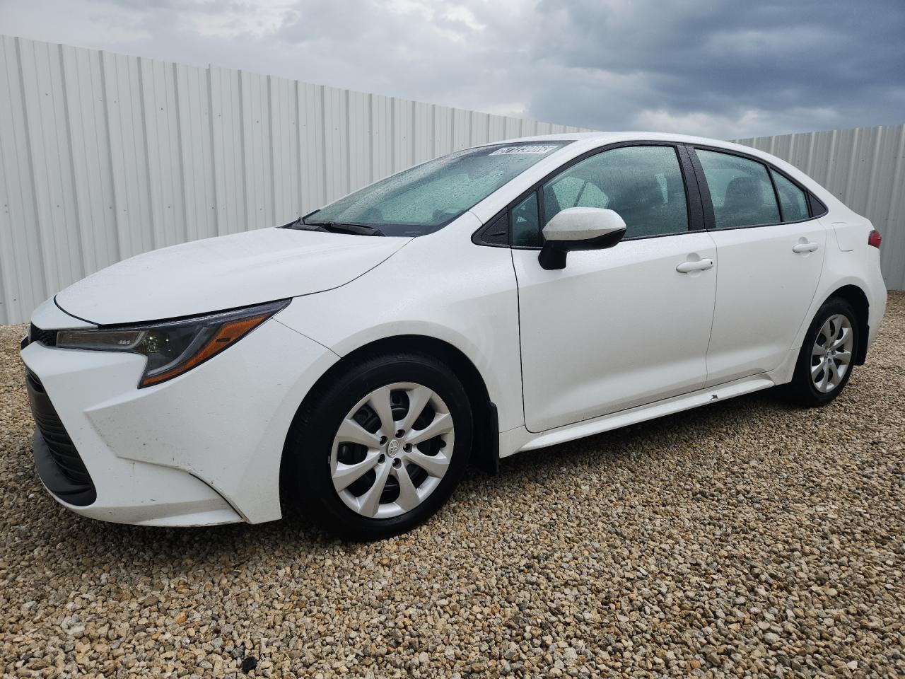 2026 Toyota Corolla Le White vin: 5YFB4MDE6TP376125 Damage: Left Rocker Panel Molding, Cracked Paint, 5 To 6 Inches