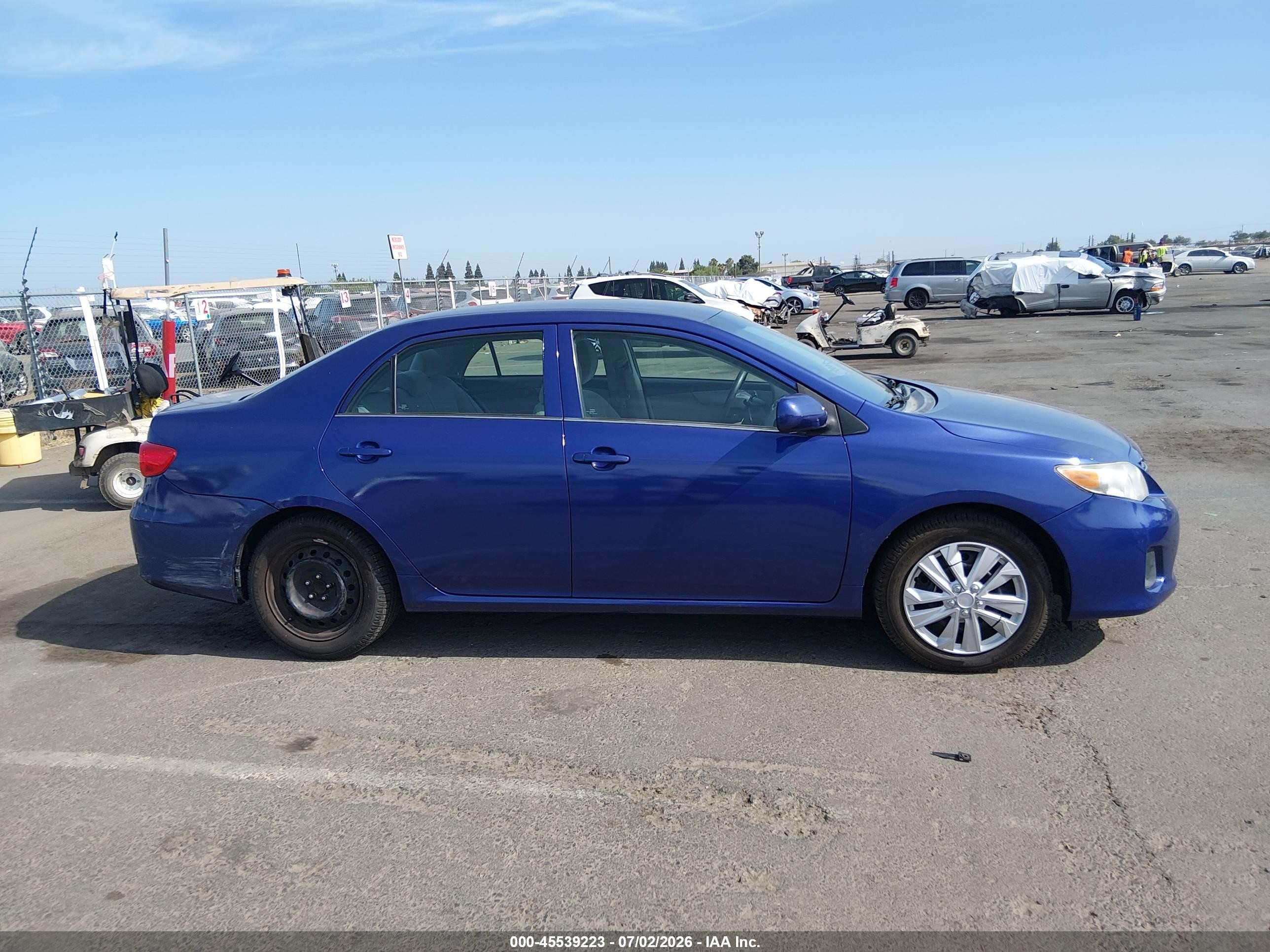 2013 Toyota Corolla Le Purple vin: 5YFBU4EE6DP205570