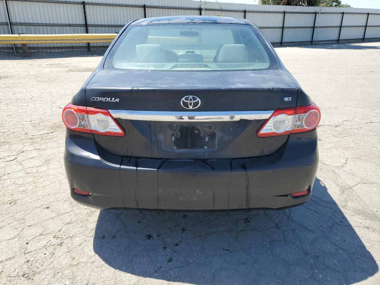 2013 Toyota Corolla Le Black vin: 5YFBU4EE9DP086736 Damage: Deck Lid, Oxidized, > 12 Inches