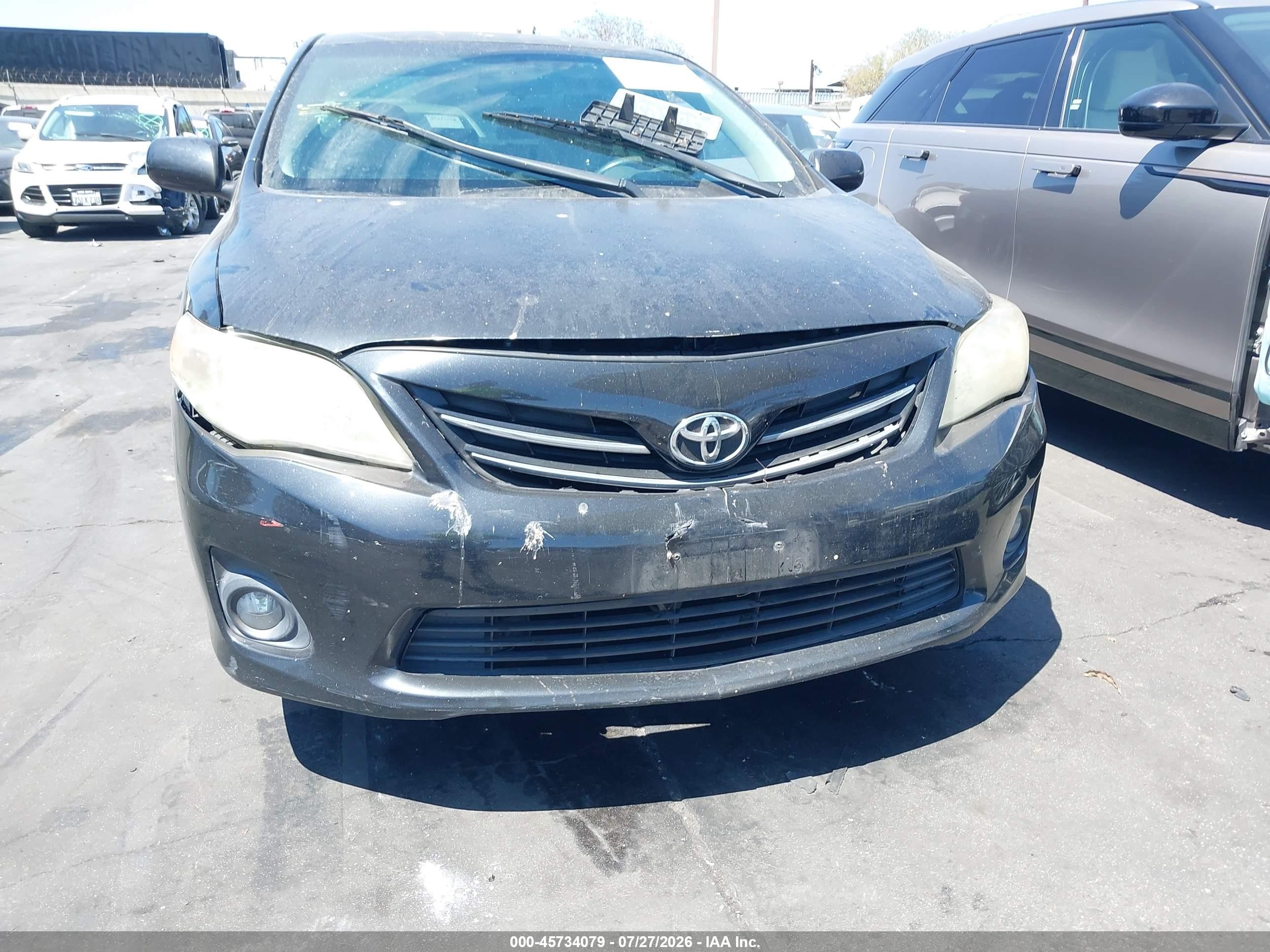 2013 Toyota Corolla Le Black vin: 5YFBU4EE9DP105091