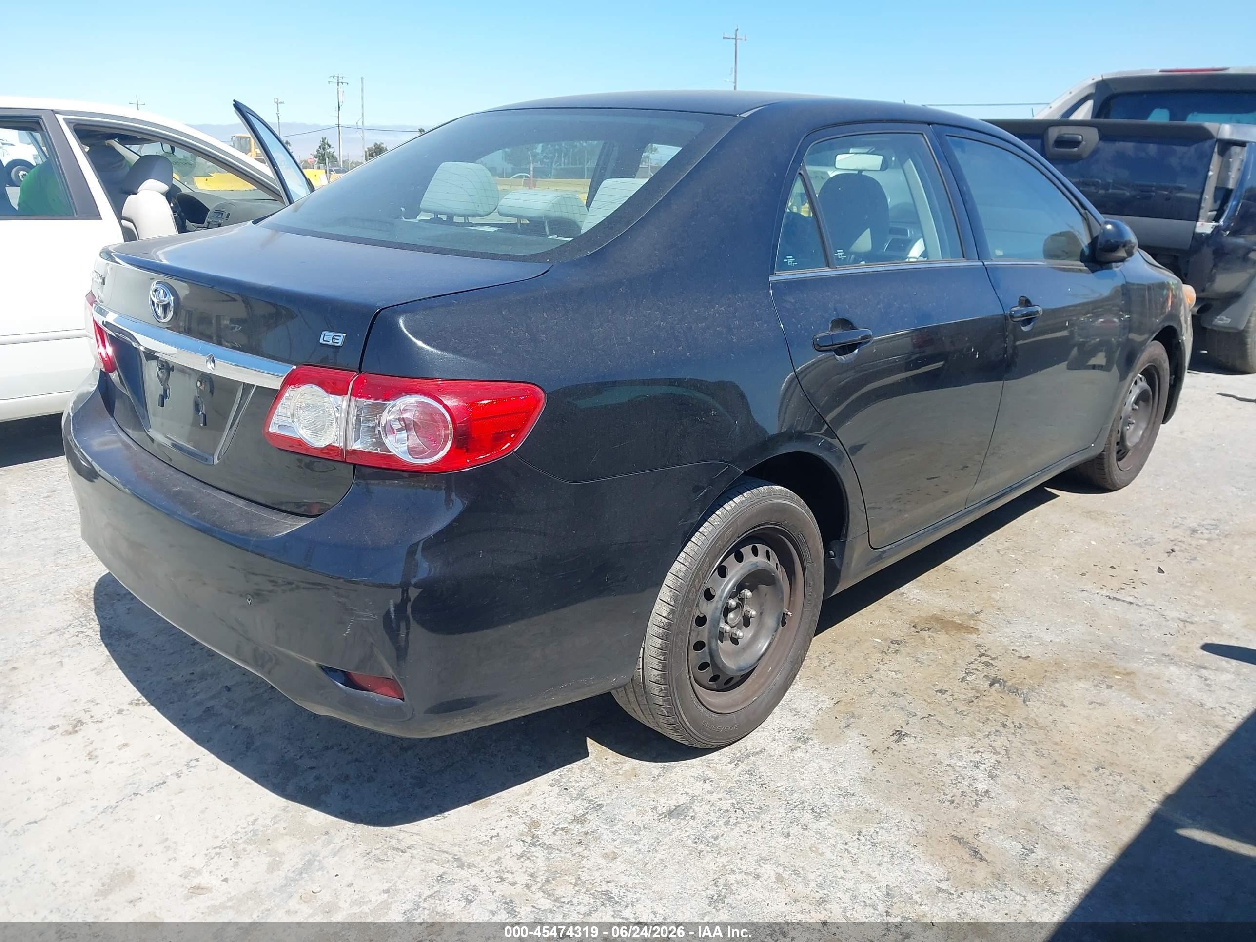 2013 Toyota Corolla Le Black vin: 5YFBU4EEXDP150654