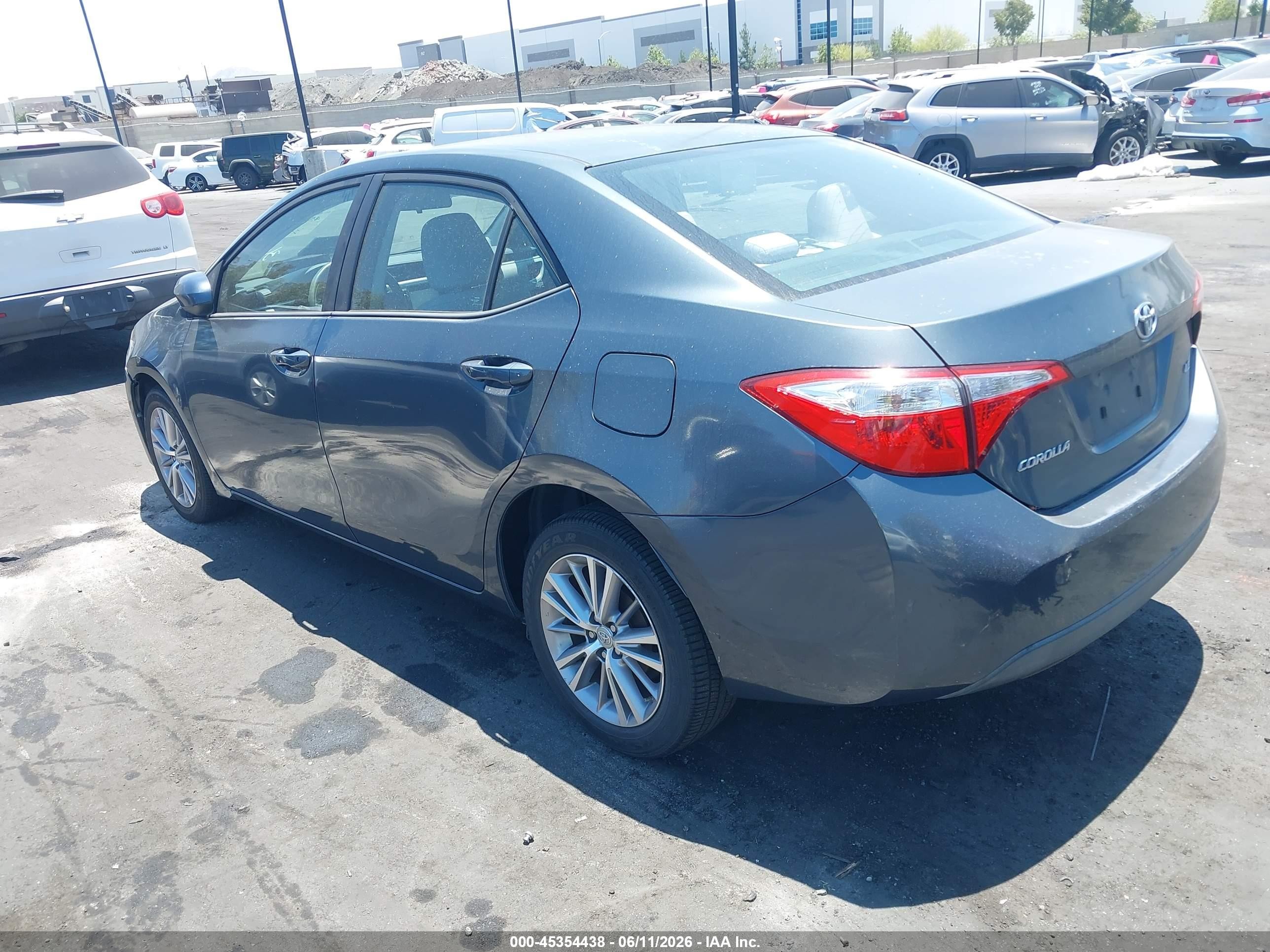 2015 Toyota Corolla Le Plus Blue vin: 5YFBURHE0FP203860