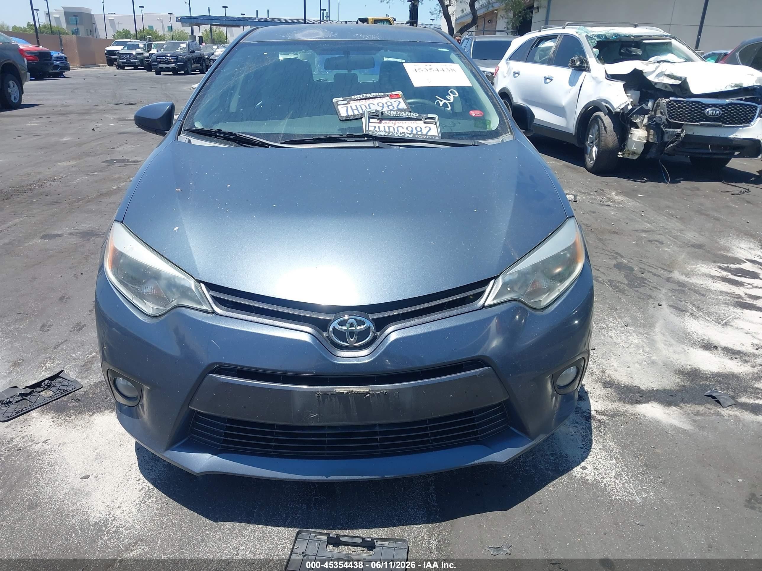 2015 Toyota Corolla Le Plus Blue vin: 5YFBURHE0FP203860