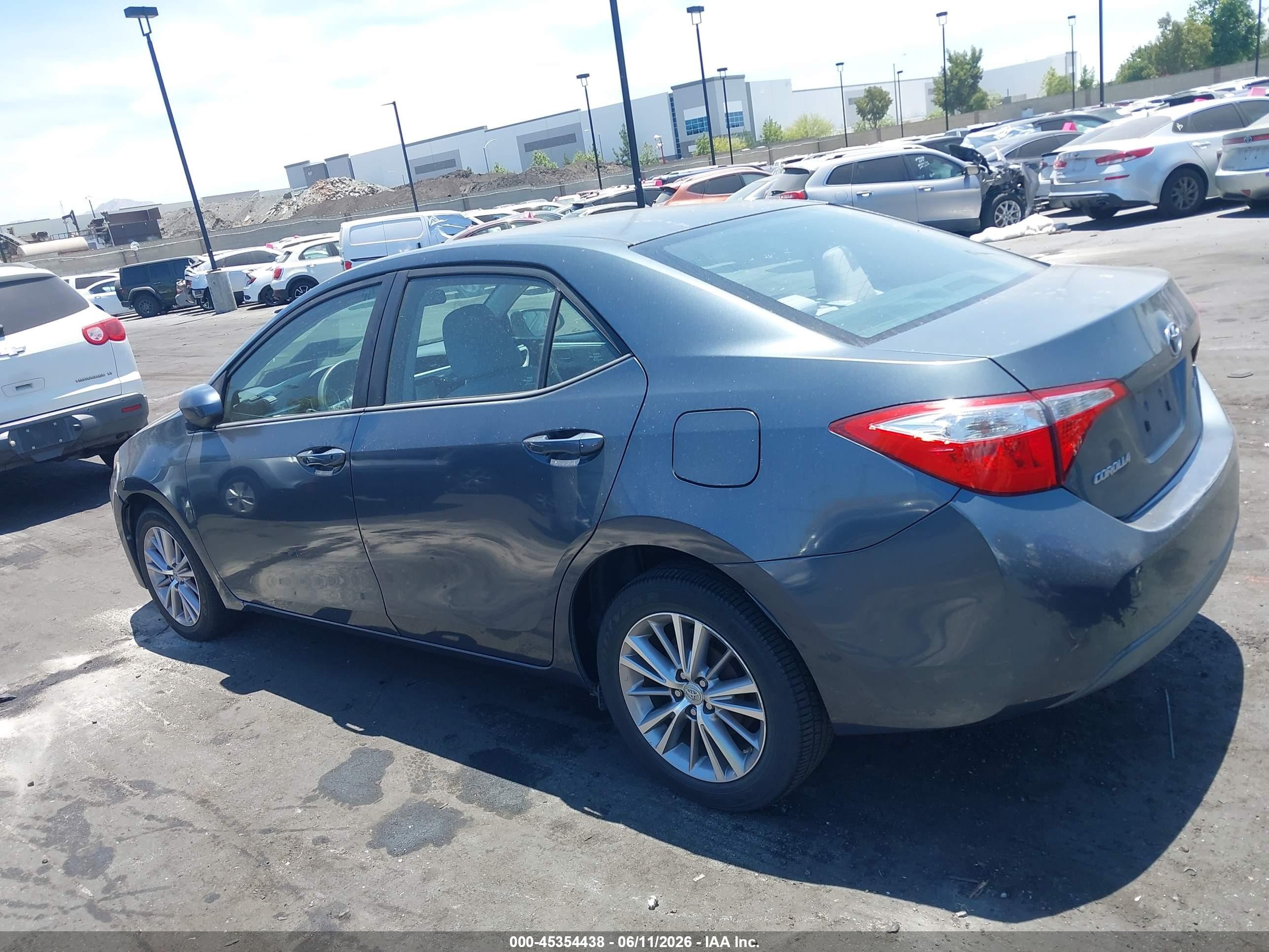 2015 Toyota Corolla Le Plus Blue vin: 5YFBURHE0FP203860