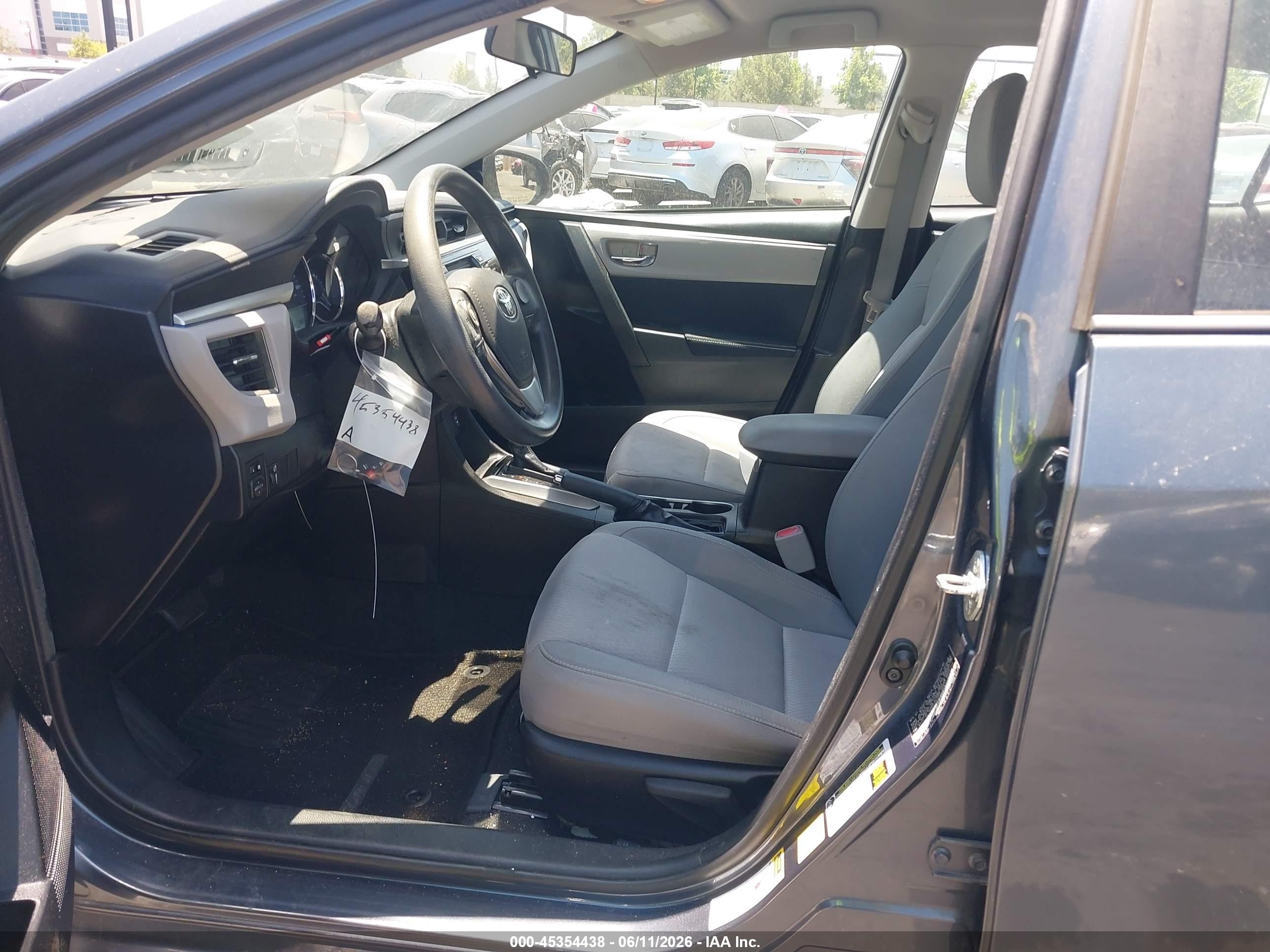 2015 Toyota Corolla Le Plus Blue vin: 5YFBURHE0FP203860