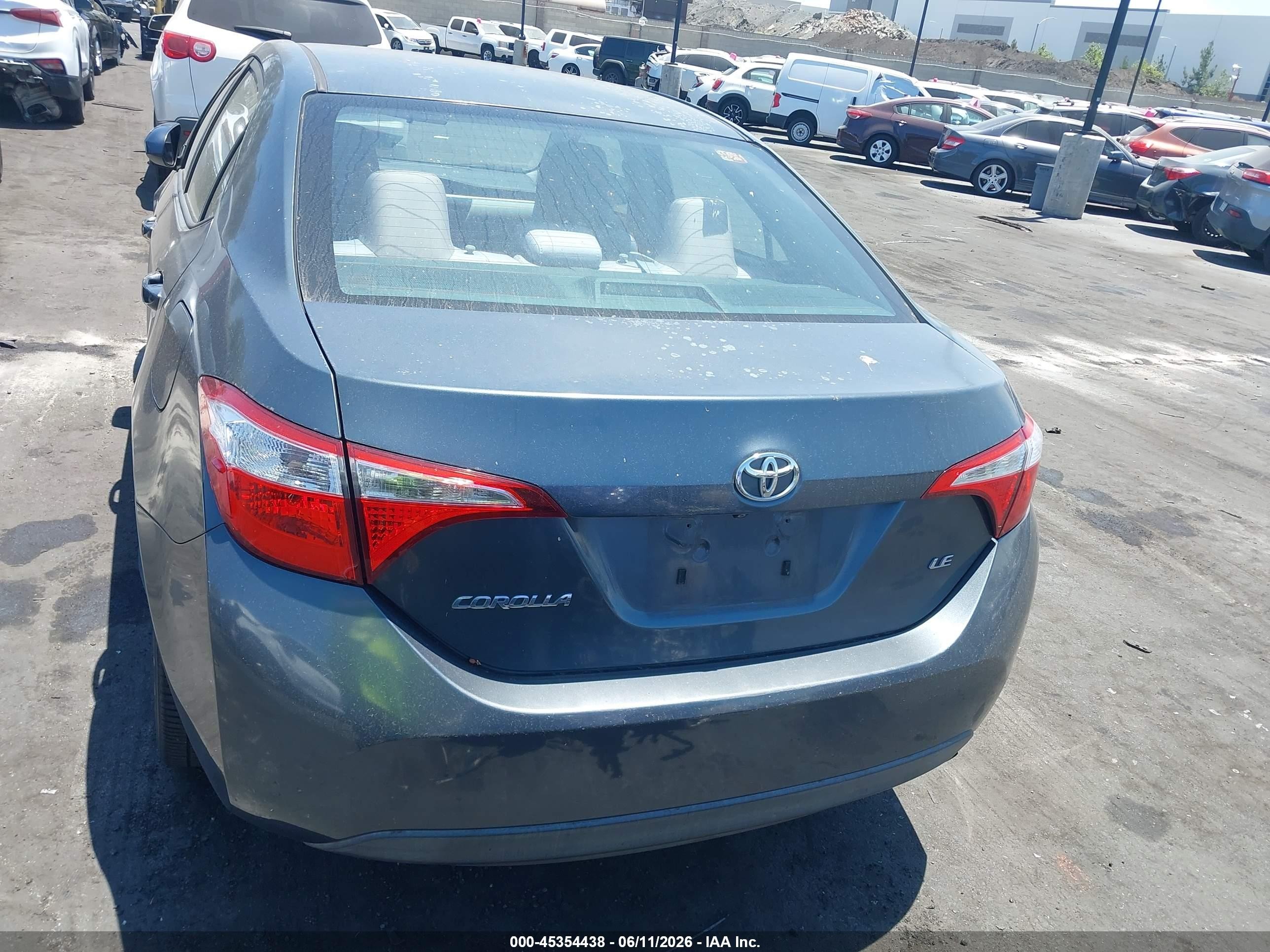 2015 Toyota Corolla Le Plus Blue vin: 5YFBURHE0FP203860