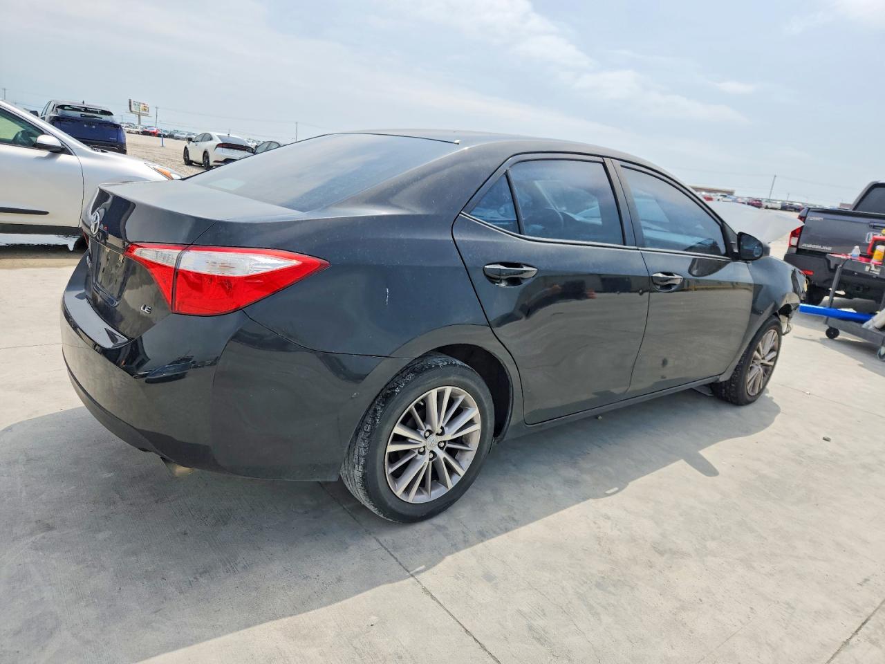 2015 Toyota Corolla Le Plus Black vin: 5YFBURHE0FP320015