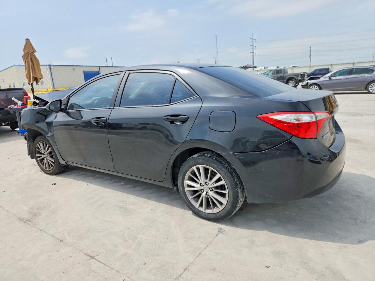 2015 Toyota Corolla Le Plus Black vin: 5YFBURHE0FP320015