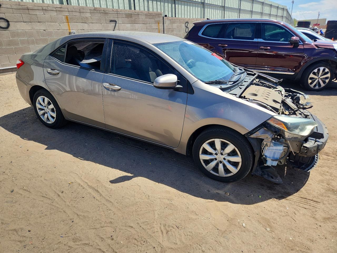 2015 Toyota Corolla Le Brown vin: 5YFBURHE2FP220529