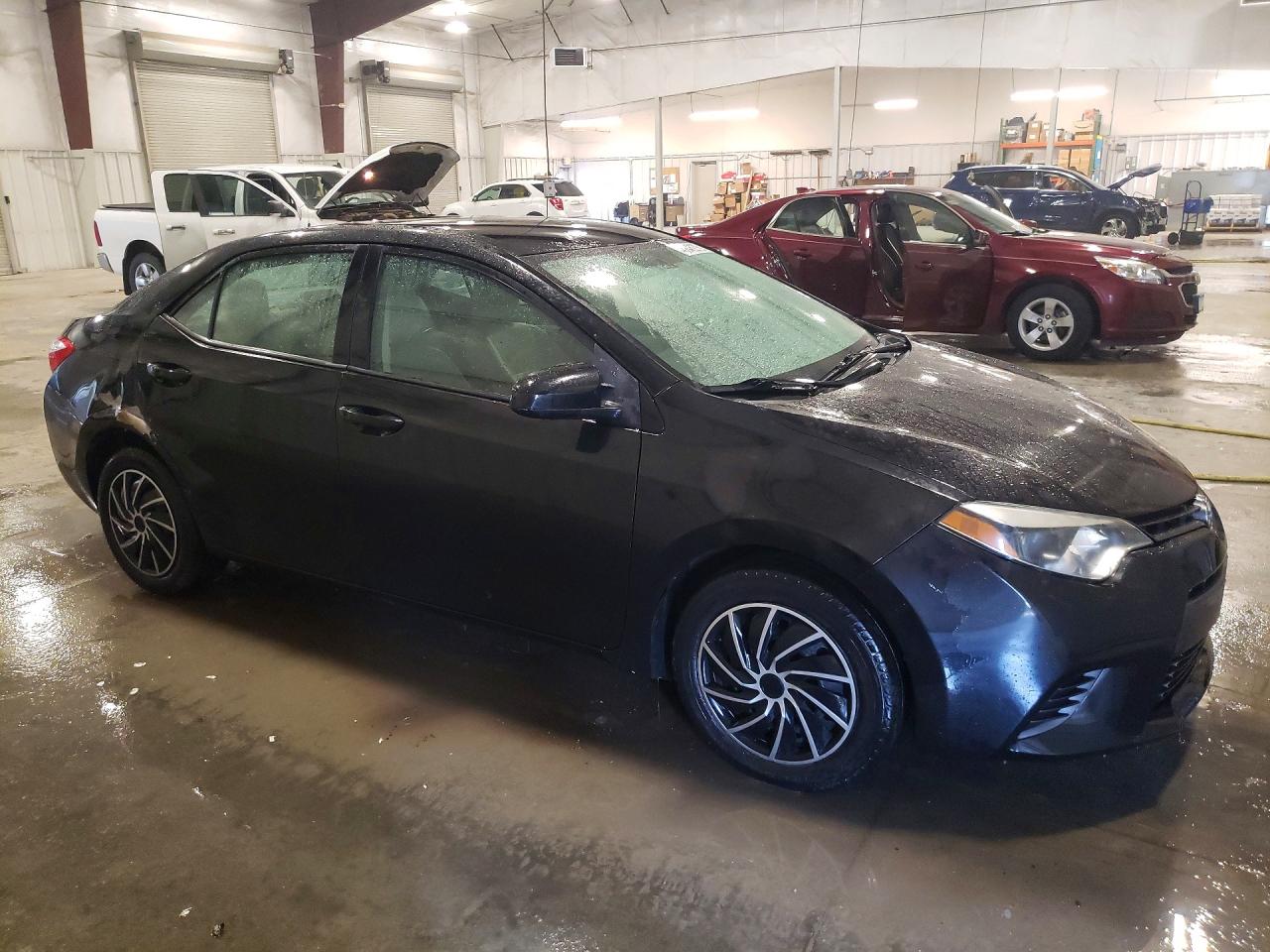 2015 Toyota Corolla Le Black vin: 5YFBURHE2FP330853