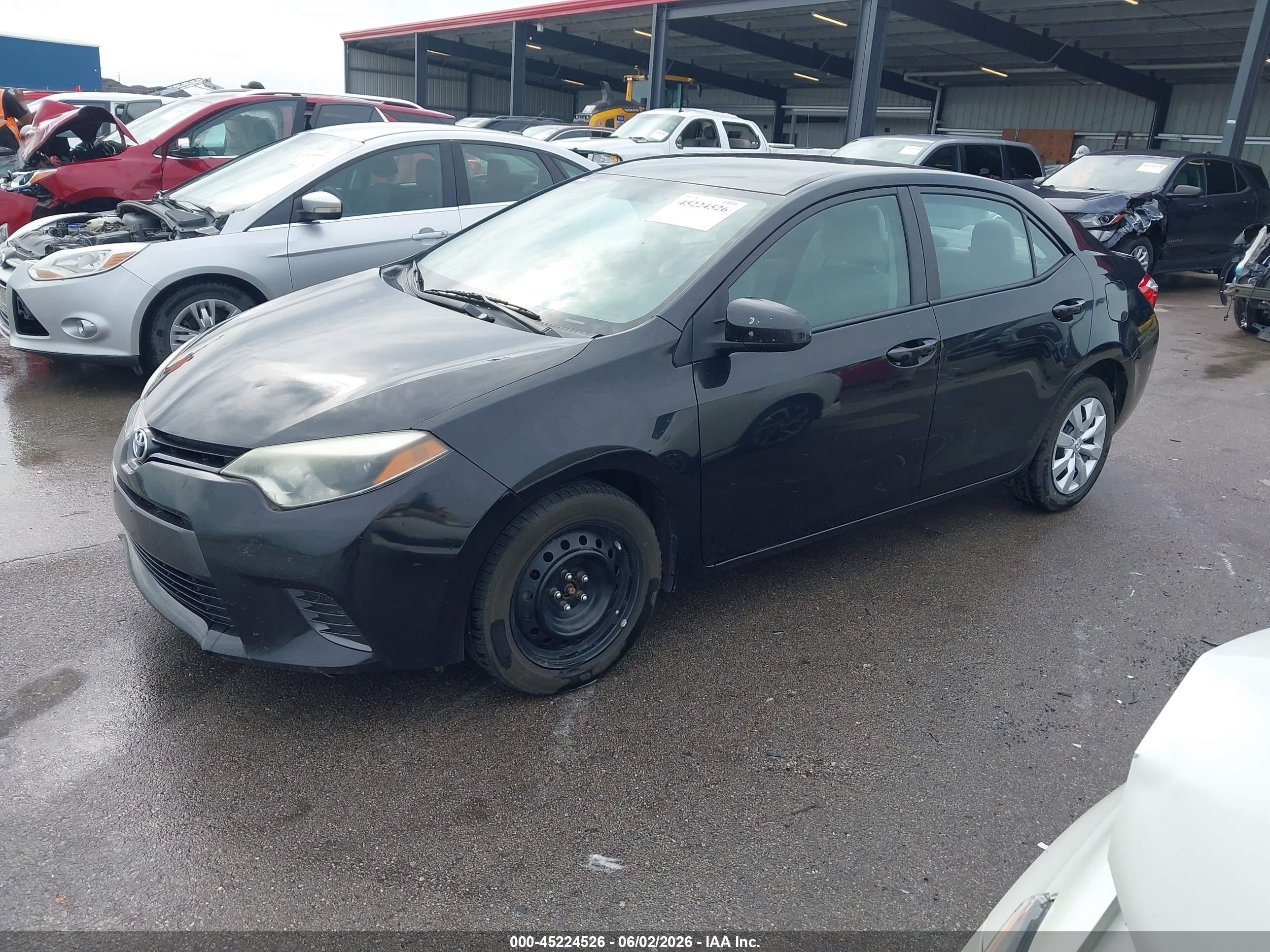 2016 Toyota Corolla Le Black vin: 5YFBURHE2GP500761