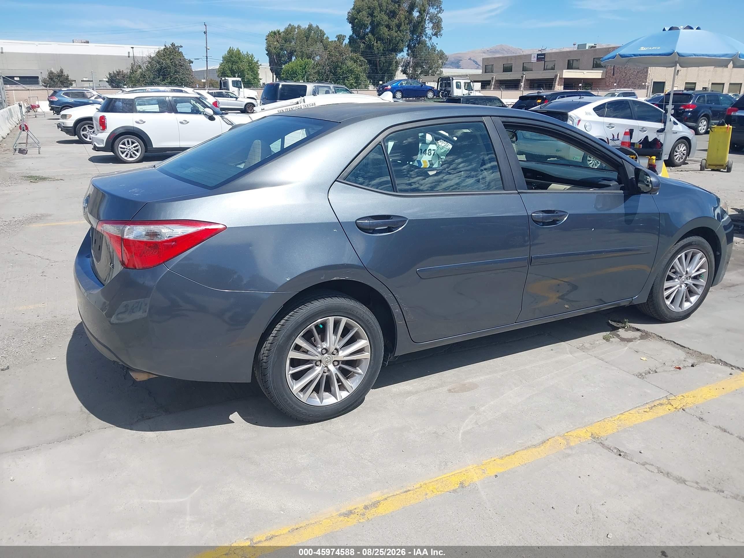 2014 Toyota Corolla Le Plus Blue vin: 5YFBURHE4EP014322