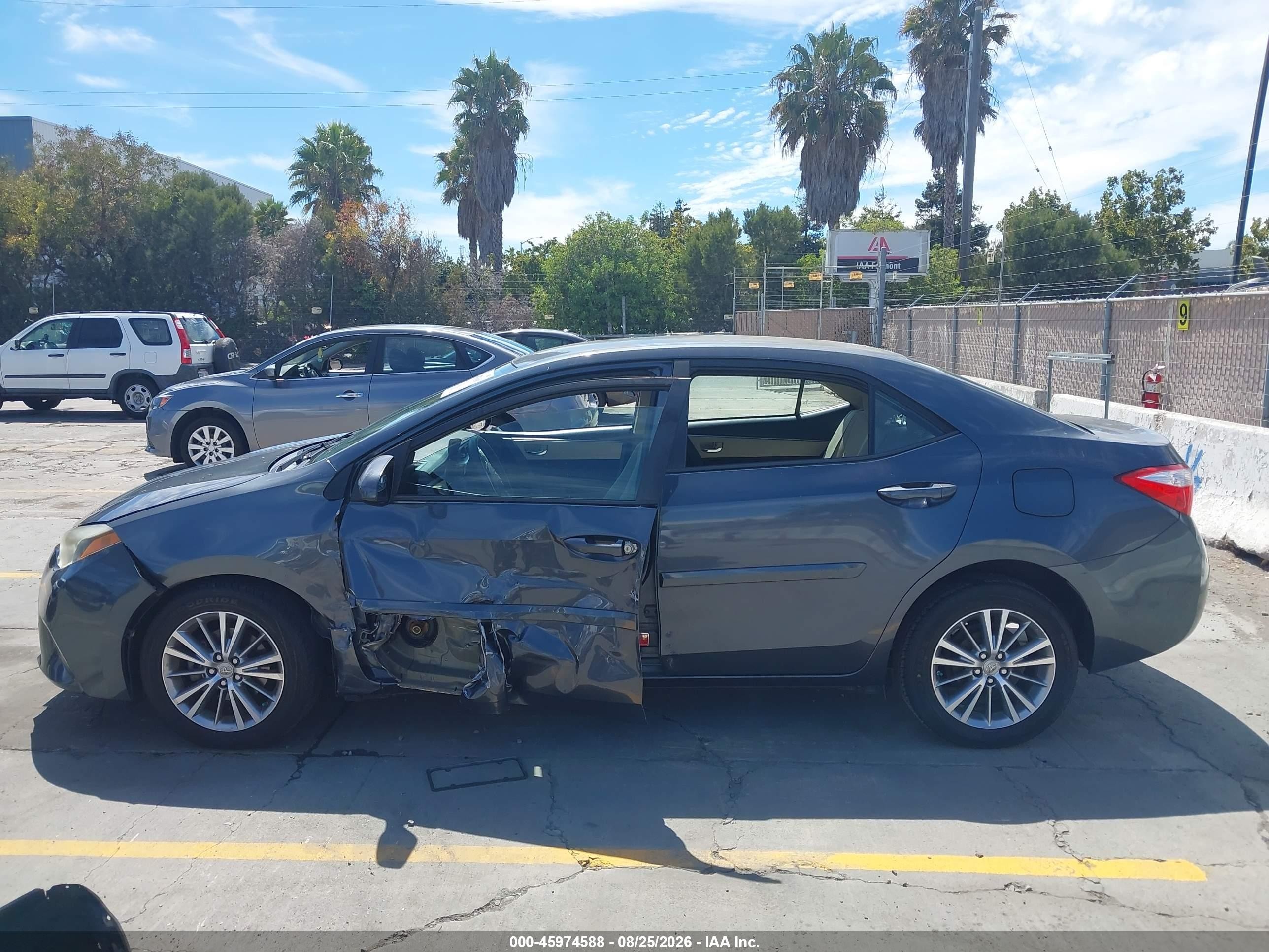 2014 Toyota Corolla Le Plus Blue vin: 5YFBURHE4EP014322