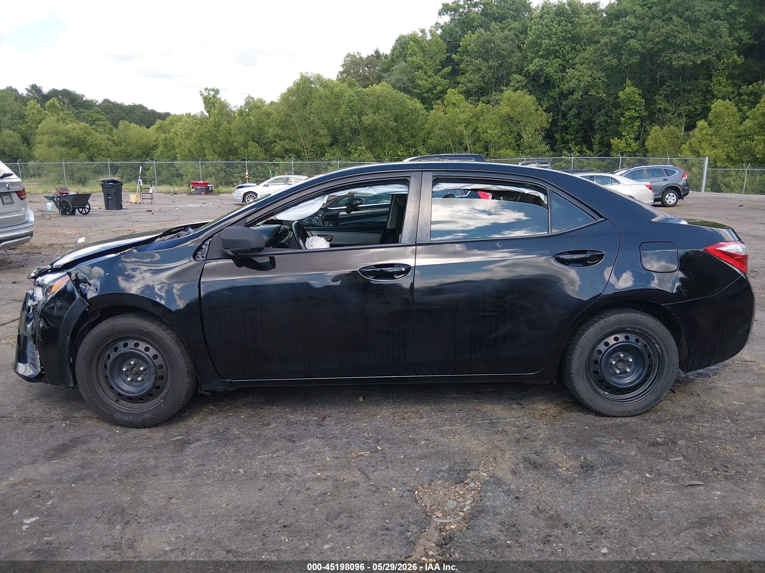 2016 Toyota Corolla Le Black vin: 5YFBURHE4GP372443
