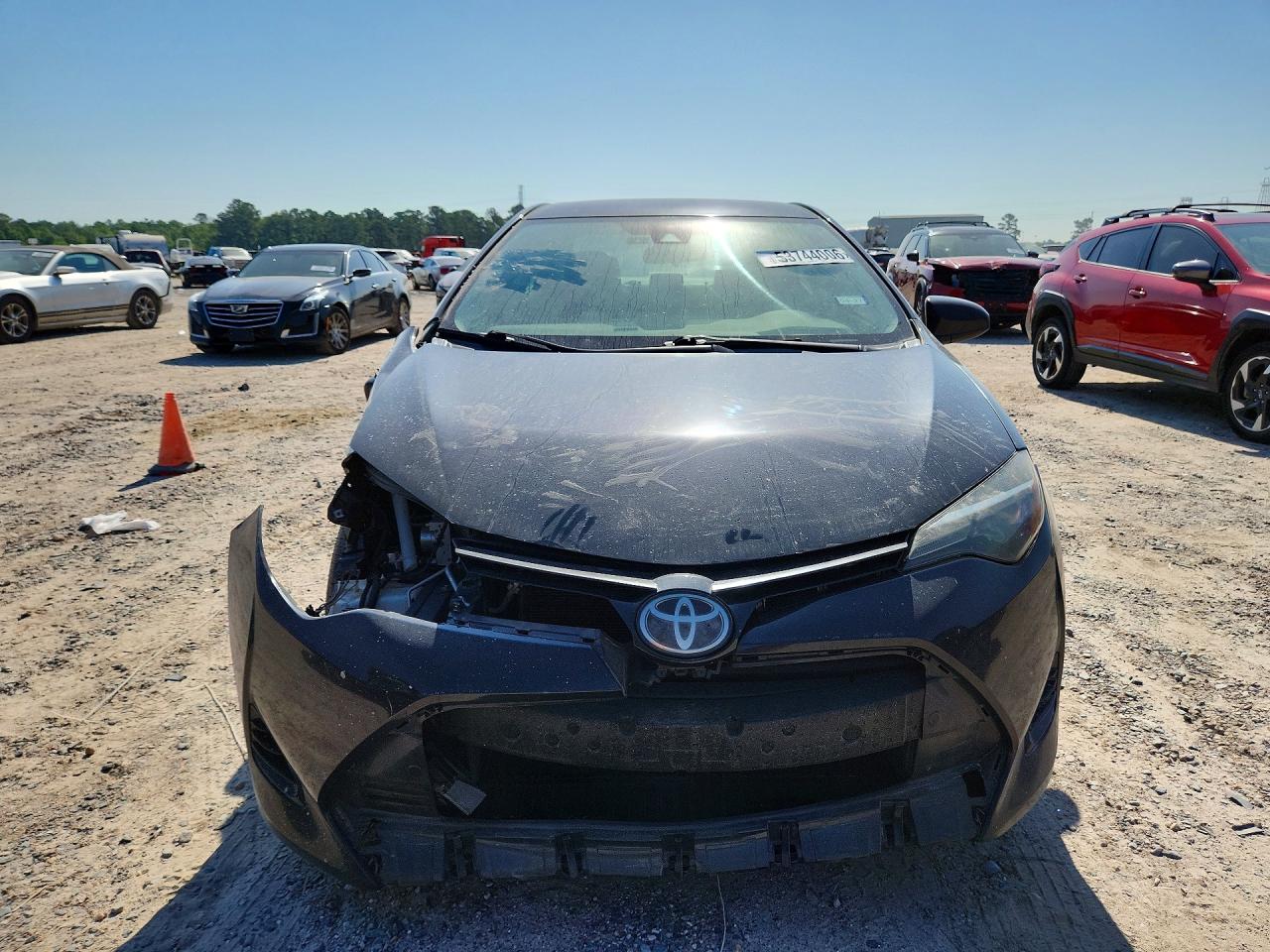 2018 Toyota Corolla Le Black vin: 5YFBURHE5JP762166