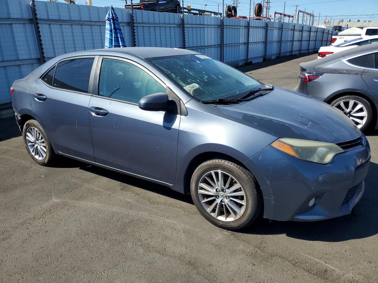 2014 Toyota Corolla Le Plus Blue vin: 5YFBURHE6EP173522