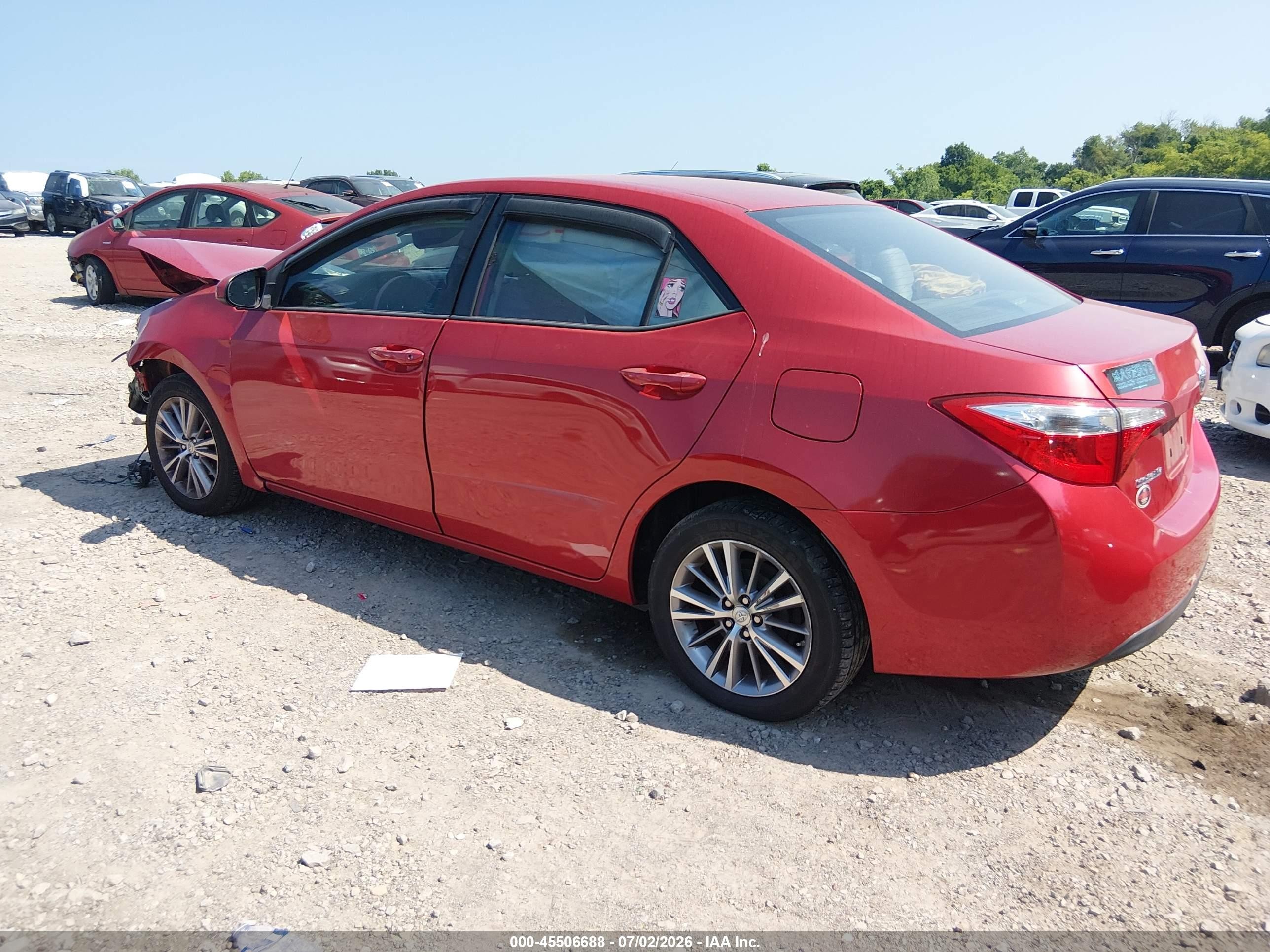 2015 Toyota Corolla Le Plus Red vin: 5YFBURHE6FP189530