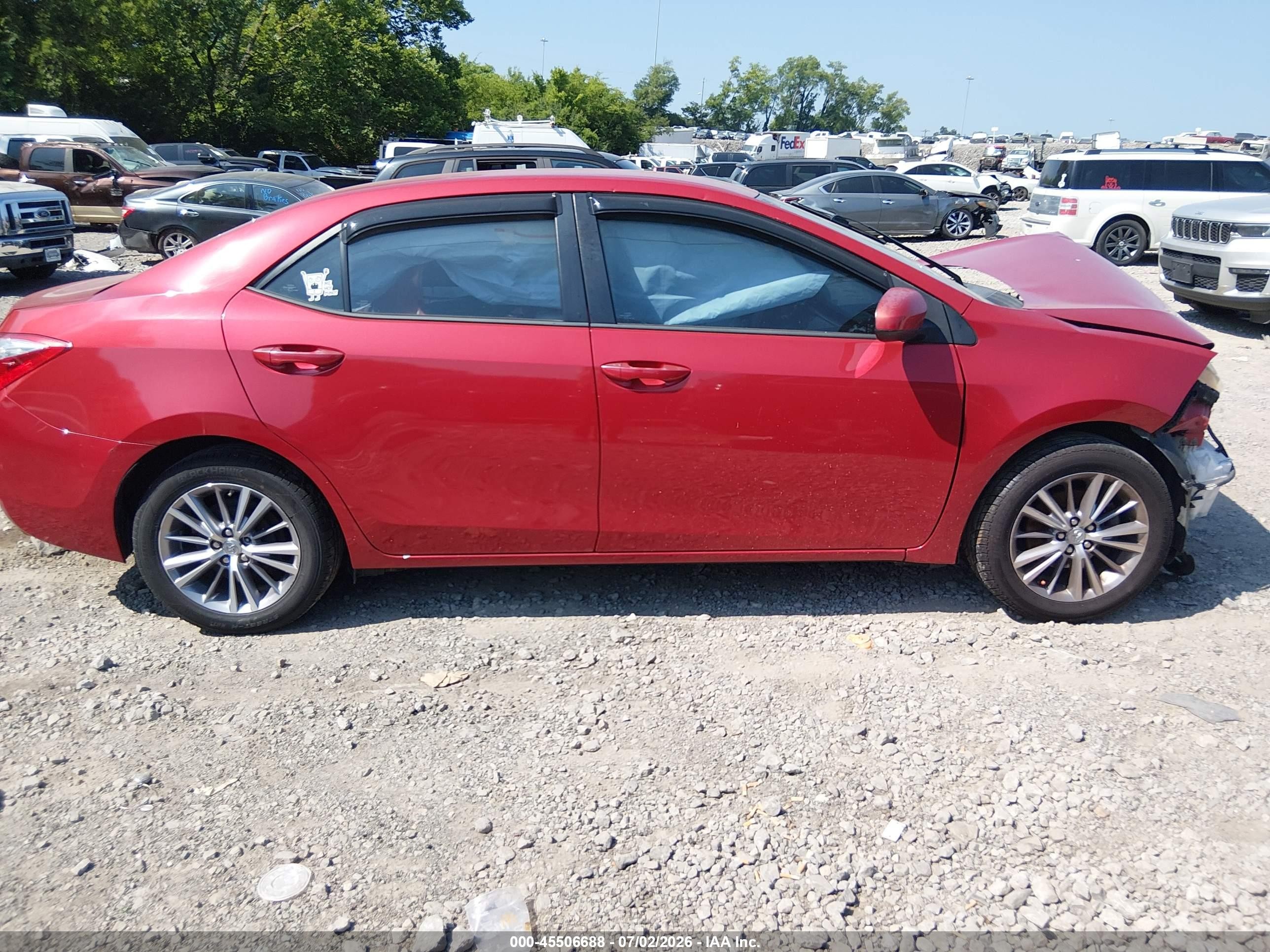 2015 Toyota Corolla Le Plus Red vin: 5YFBURHE6FP189530