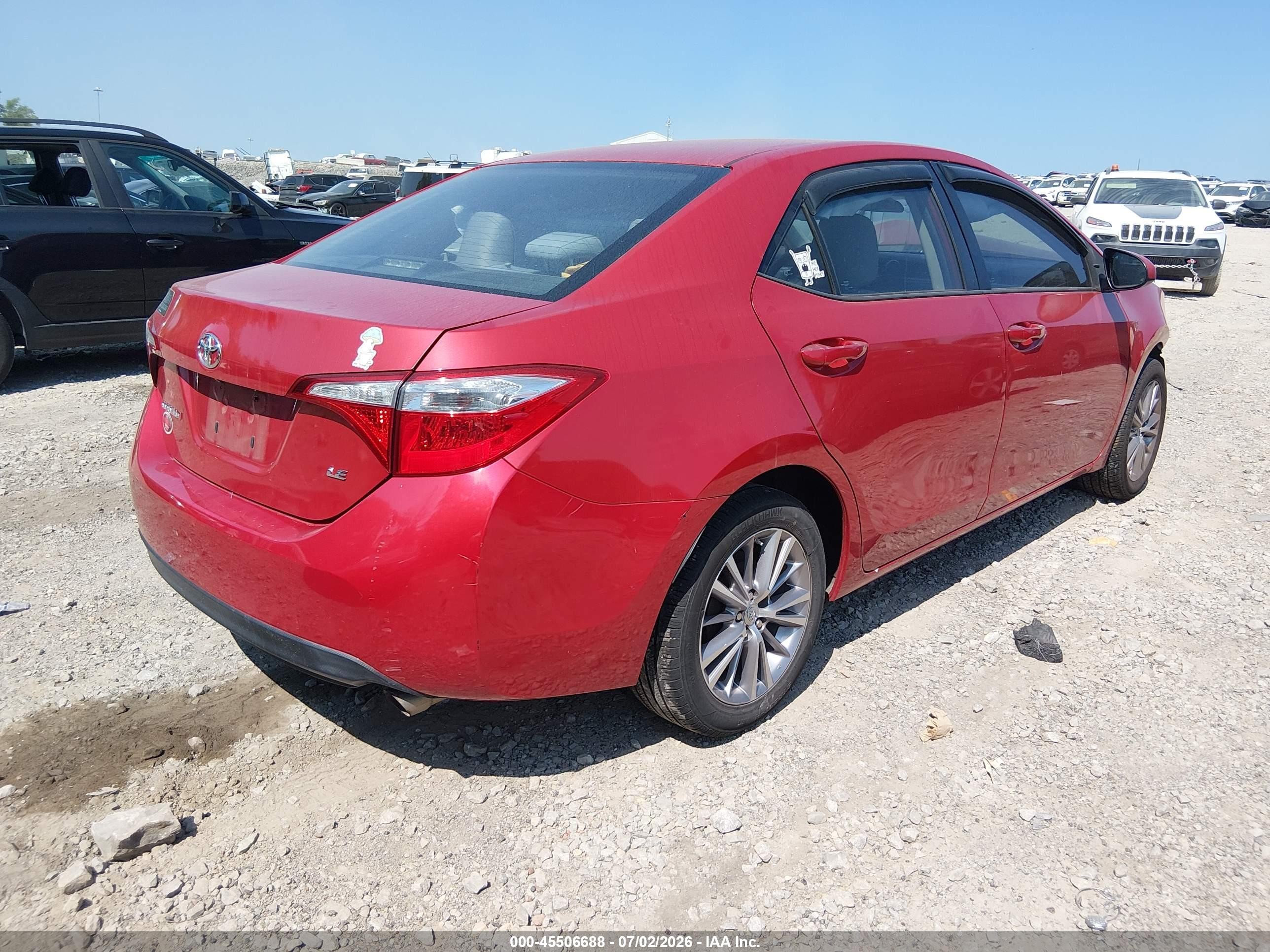 2015 Toyota Corolla Le Plus Red vin: 5YFBURHE6FP189530