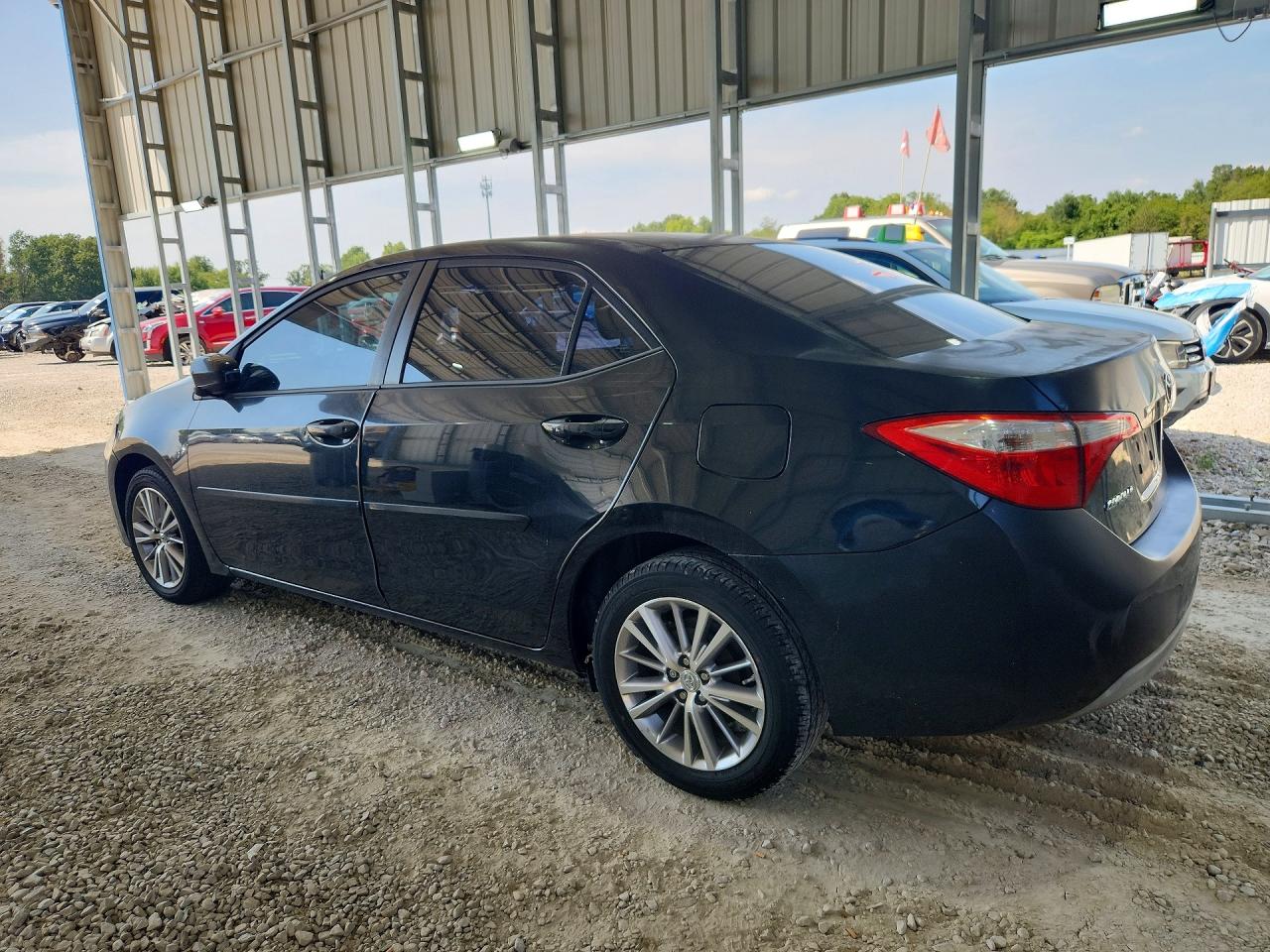 2015 Toyota Corolla Le Plus Black vin: 5YFBURHE7FP265045