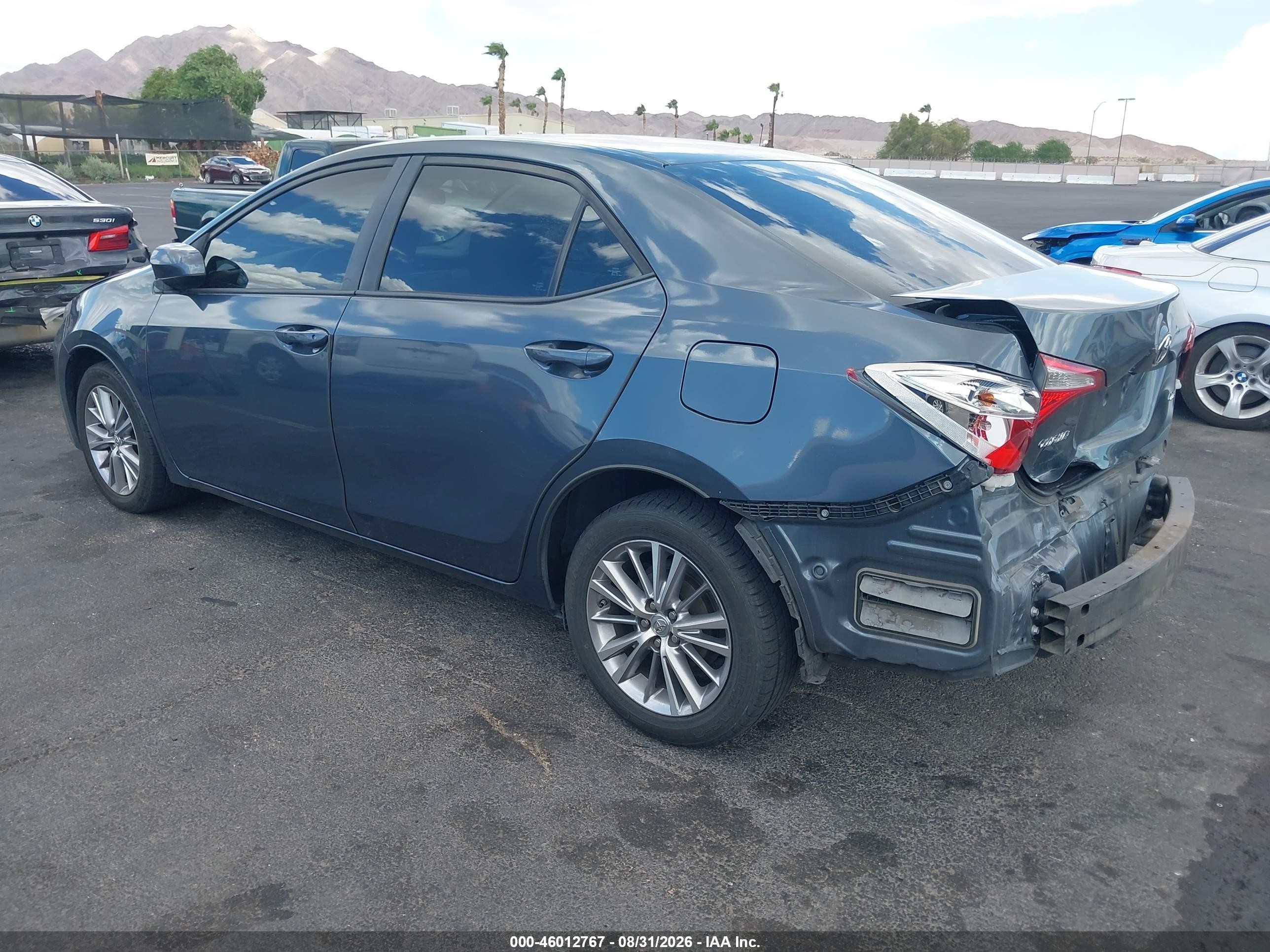 2015 Toyota Corolla Le Plus Blue vin: 5YFBURHE7FP275543