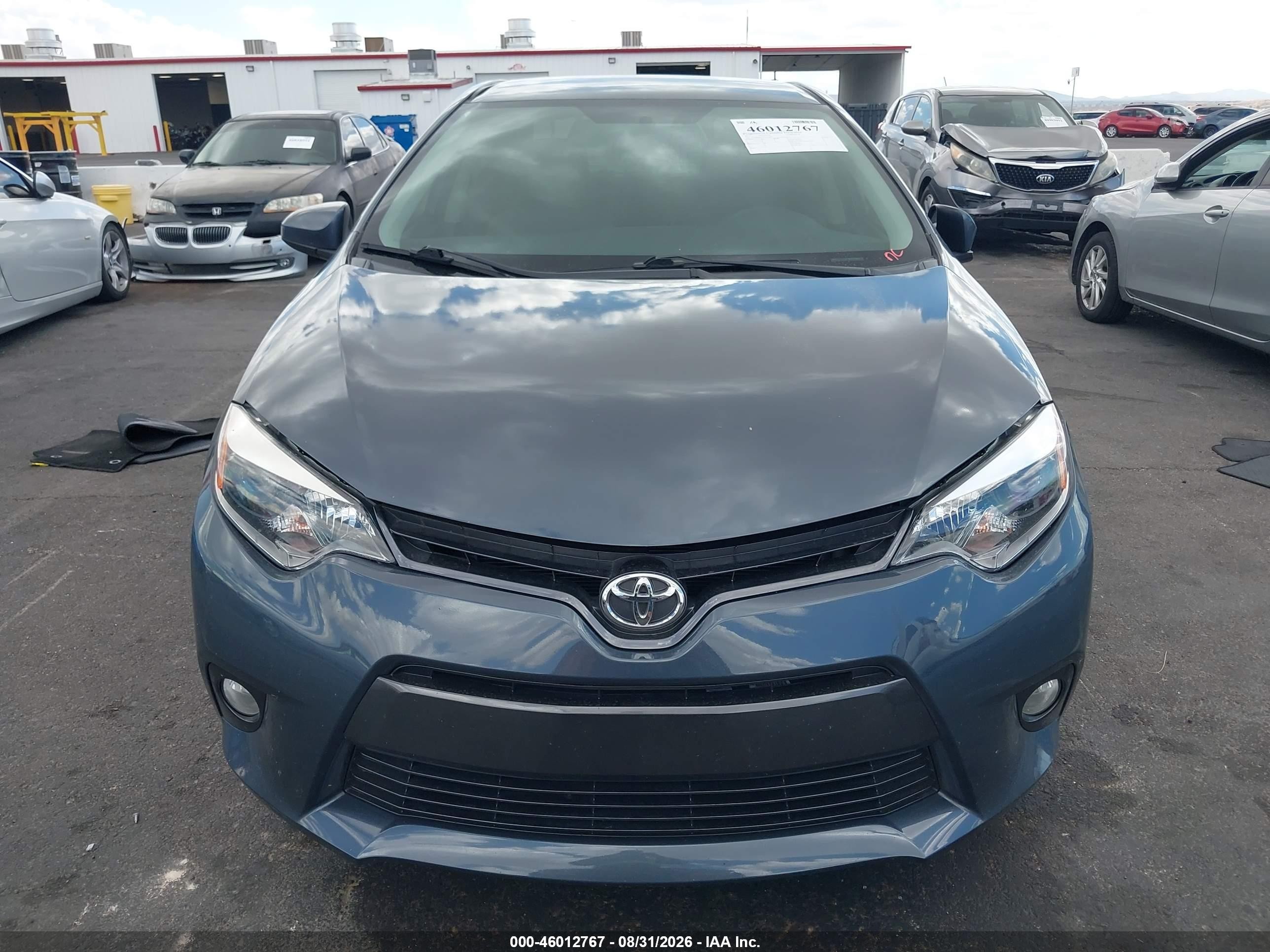2015 Toyota Corolla Le Plus Blue vin: 5YFBURHE7FP275543