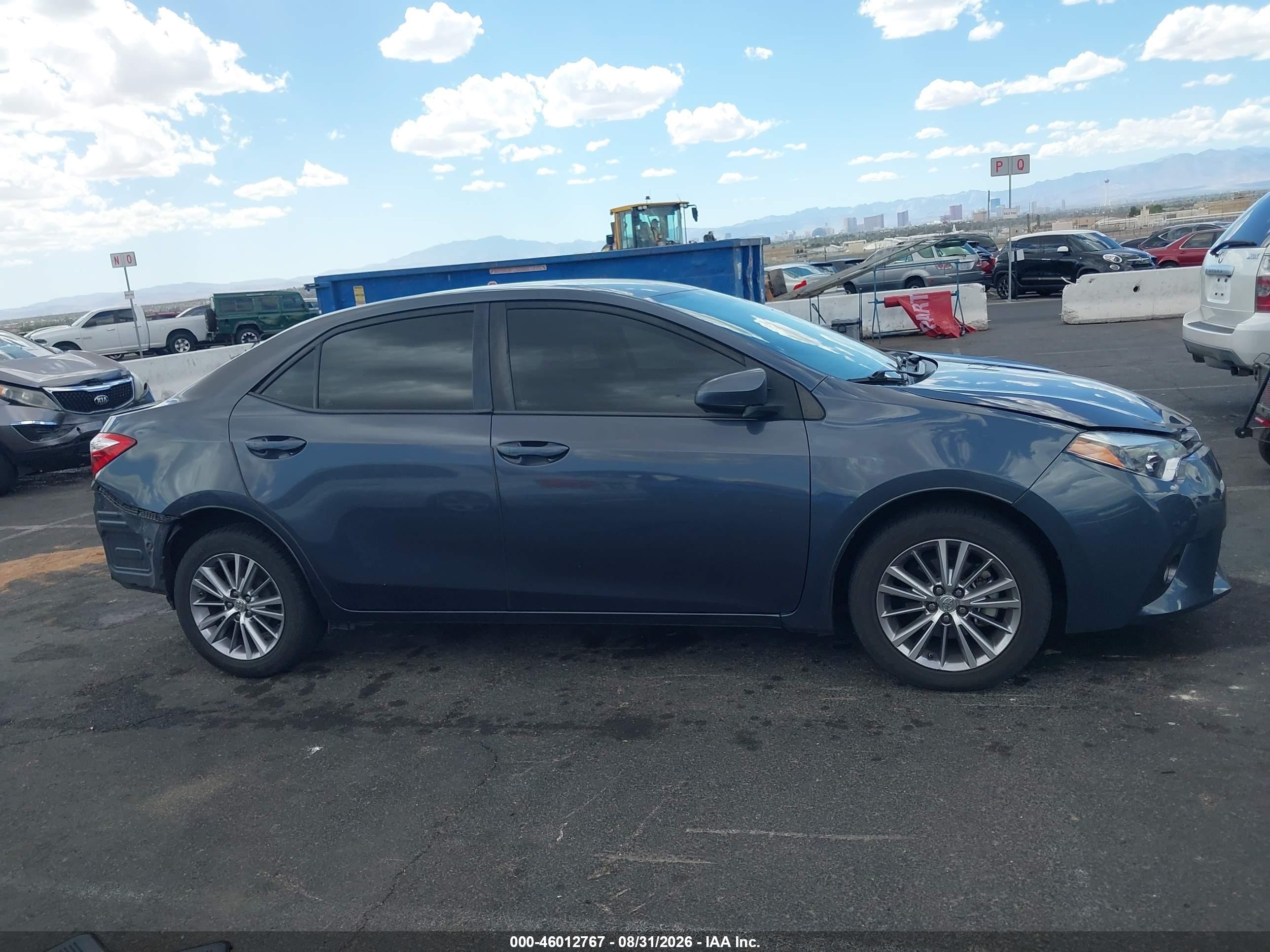 2015 Toyota Corolla Le Plus Blue vin: 5YFBURHE7FP275543