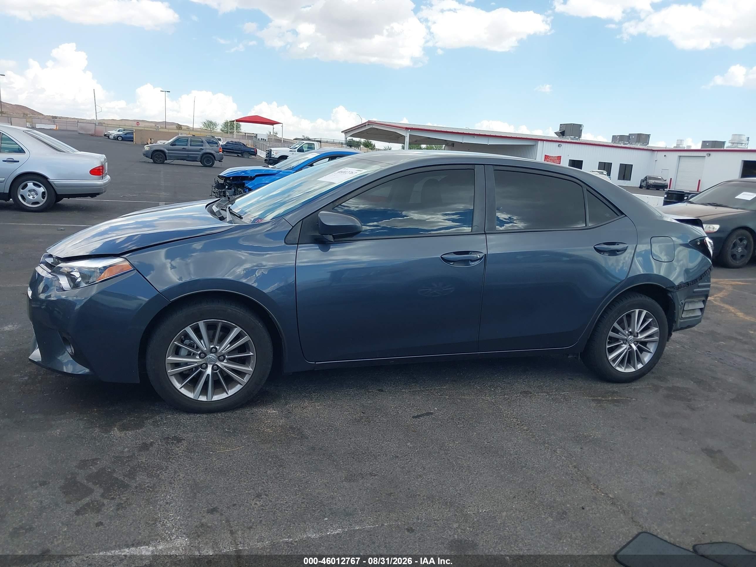 2015 Toyota Corolla Le Plus Blue vin: 5YFBURHE7FP275543