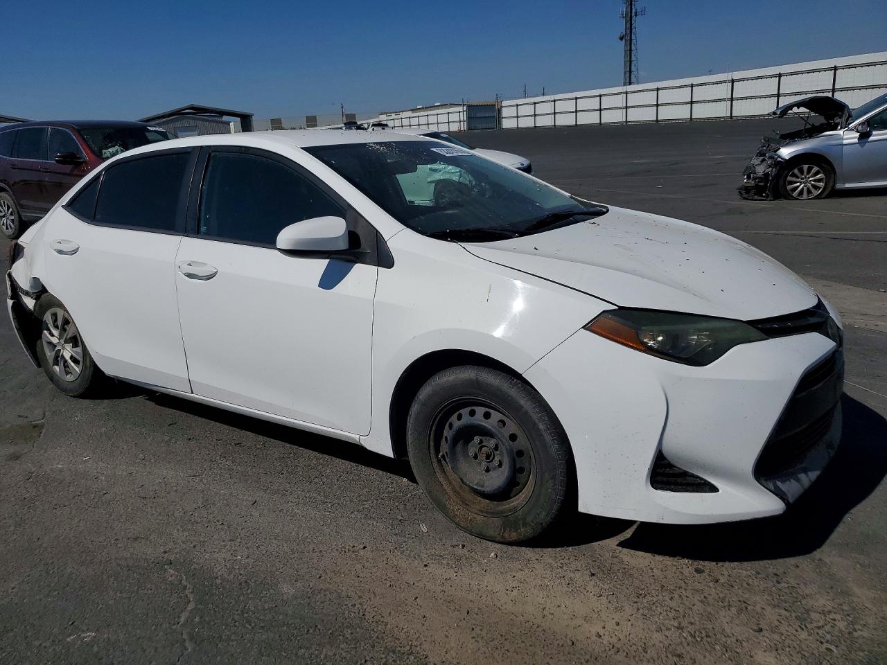 2017 Toyota Corolla L White vin: 5YFBURHE8HP673587