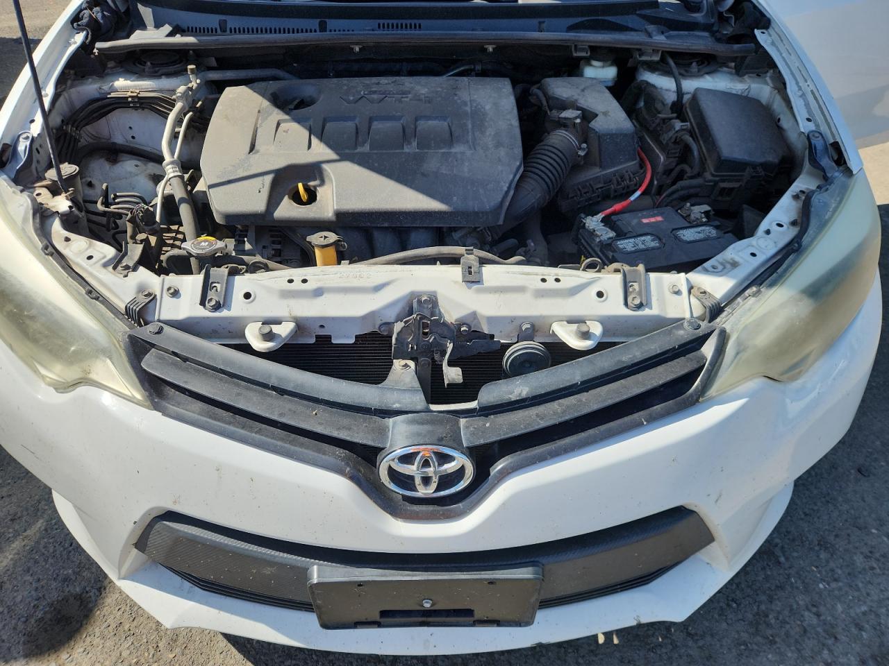 2014 Toyota Corolla L White vin: 5YFBURHEXEP152561 Damage: Left Head Lamp, Faded, Repair Required