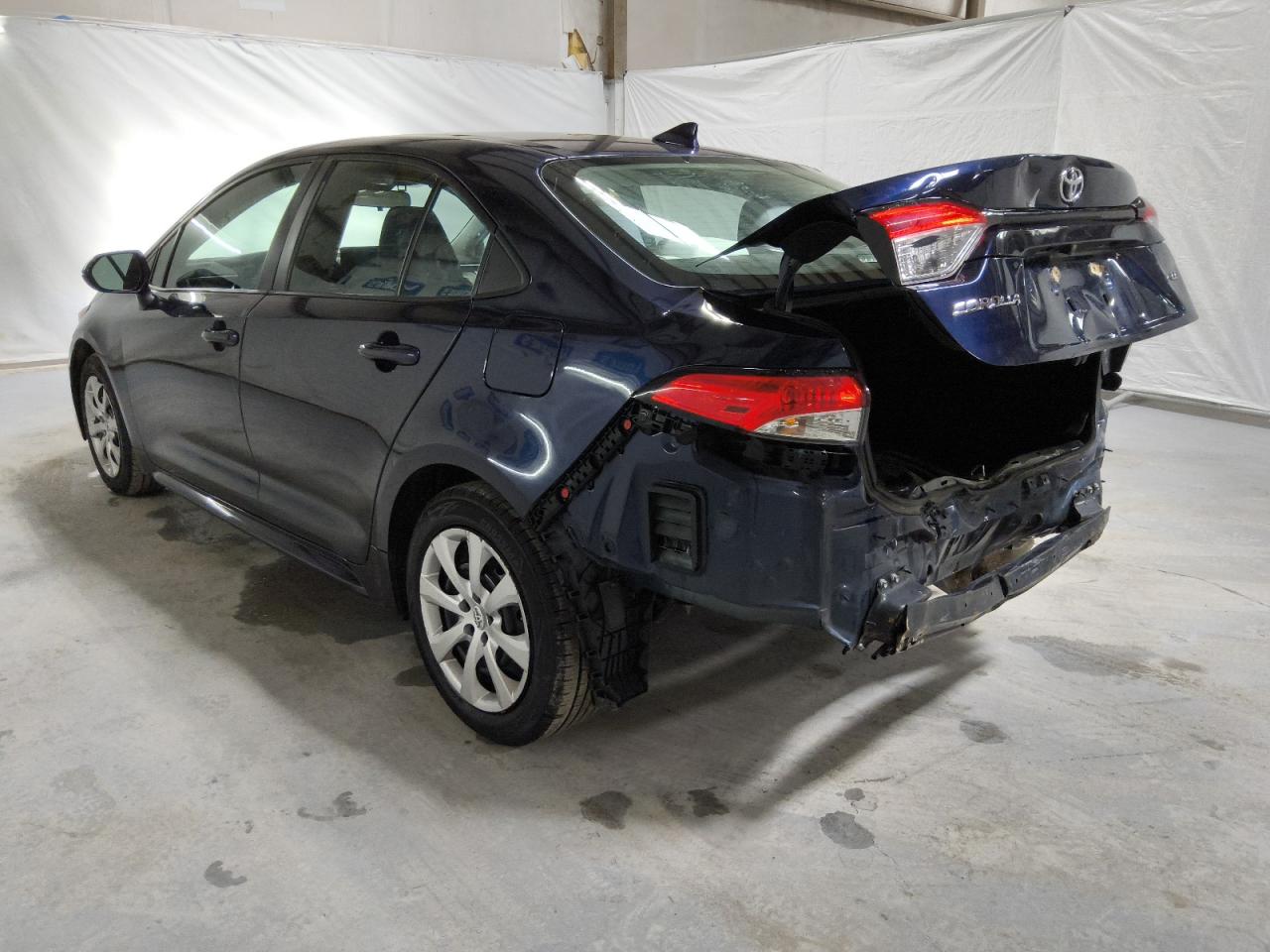 2022 Toyota Corolla Le Blue vin: 5YFEPMAE1NP385049 Damage: Rear Bumper Molding, Broken, Replacement Required