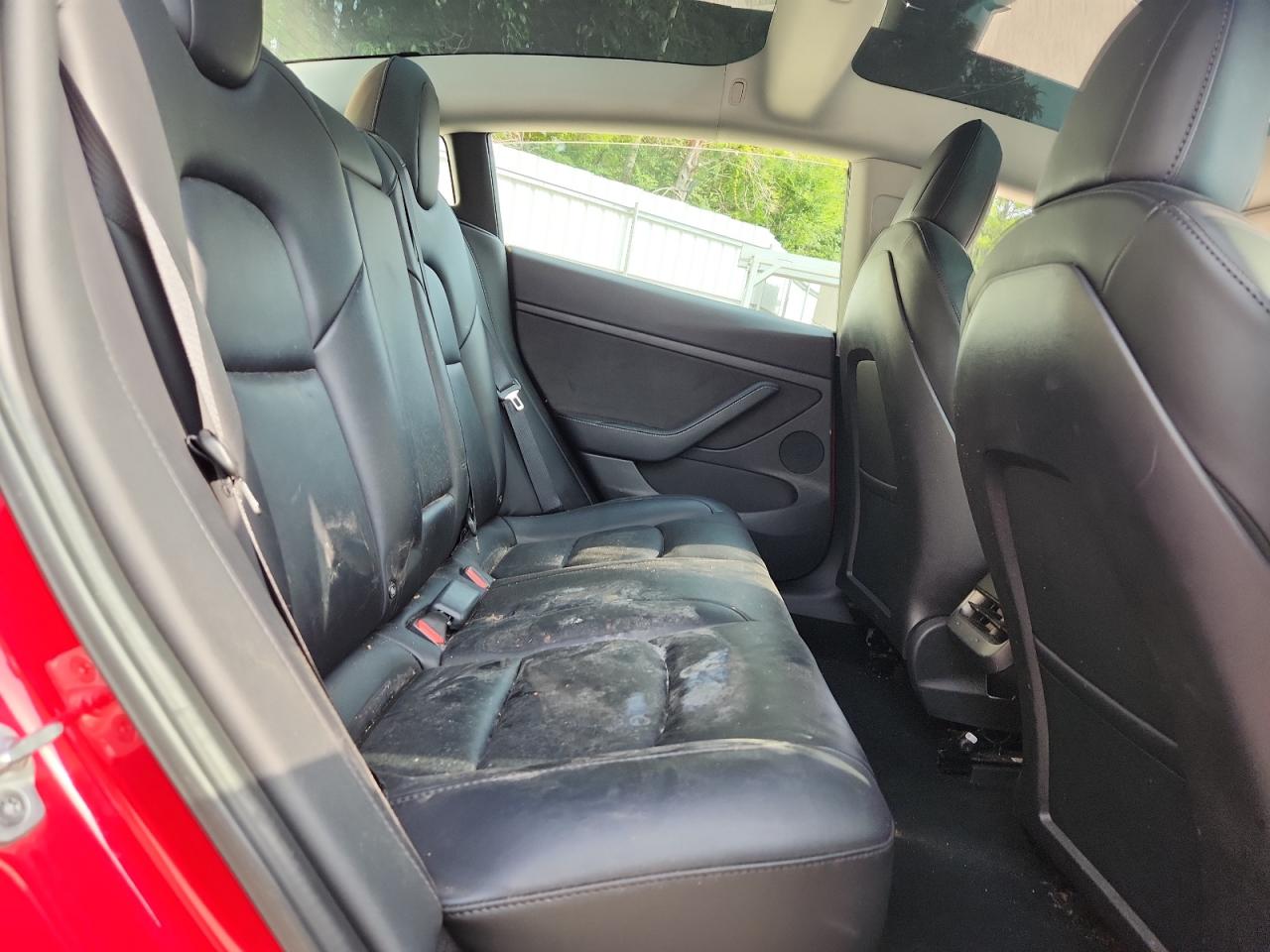 2023 Tesla Model 3 Red vin: 5YJ3E1EA2PF435295 Damage: Right Rear Seat Cushion, Stained, Permanent