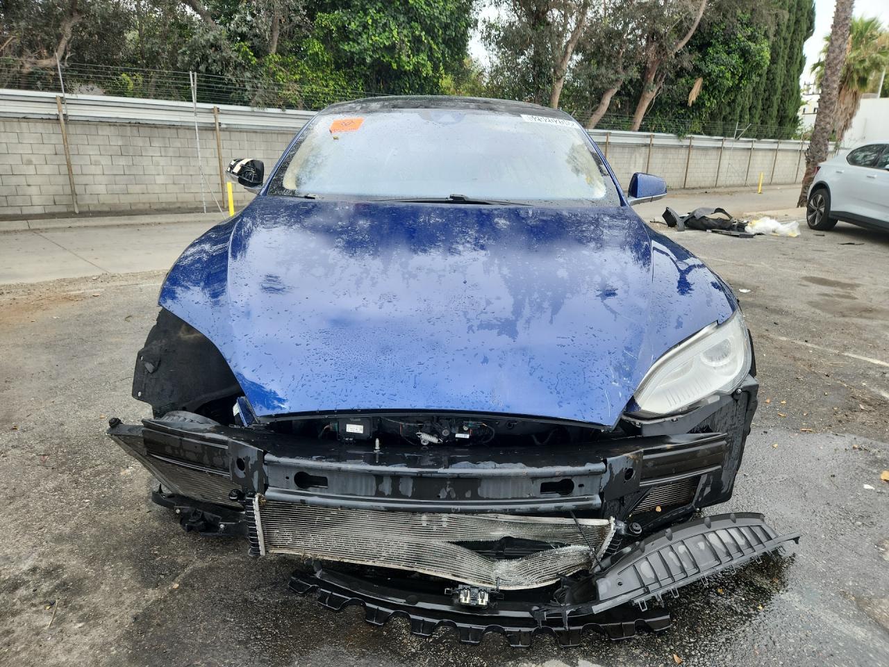 2015 Tesla Model S Blue vin: 5YJSA1E20FF114287 Damage: Grille, Missing, Replacement Required
