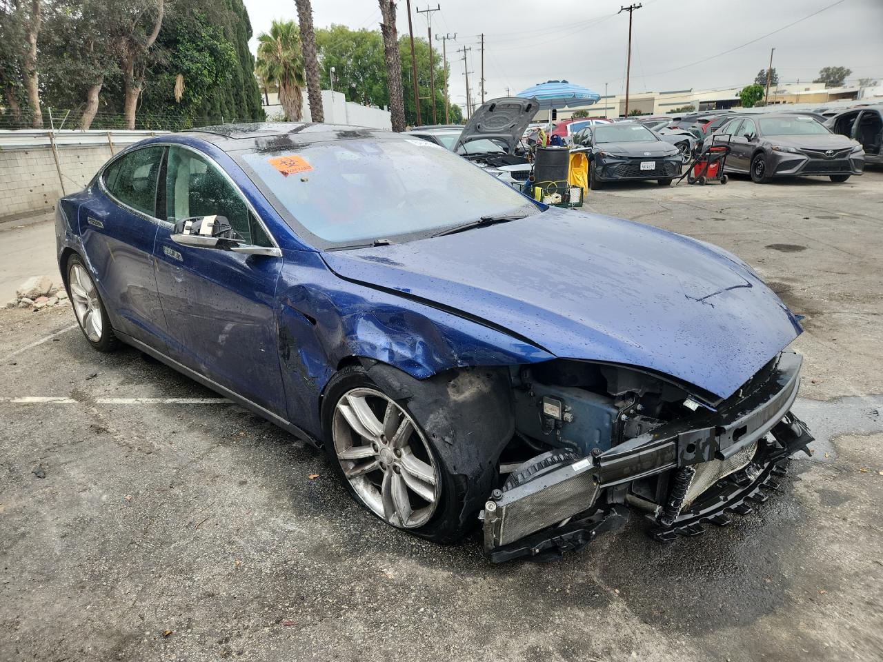 2015 Tesla Model S Blue vin: 5YJSA1E20FF114287 Damage: Hood, Misaligned, Repair Required