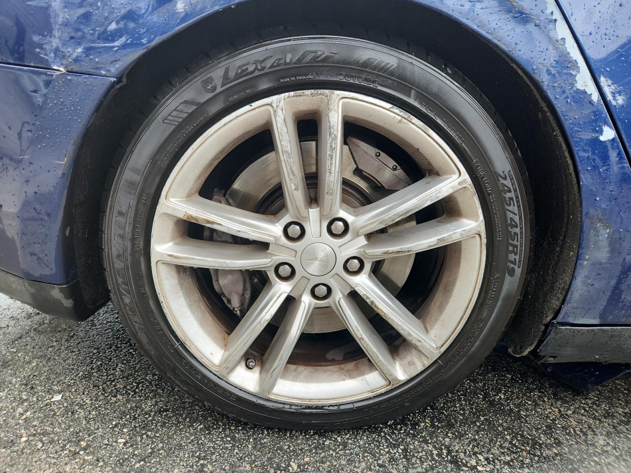 2015 Tesla Model S Blue vin: 5YJSA1E20FF114287 Damage: Right Rear Wheel, Curb Rash, > 12 Inches