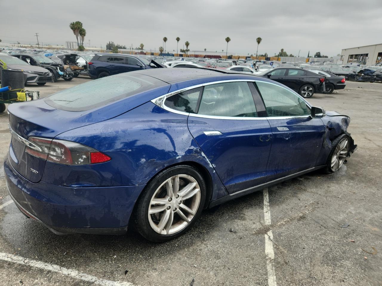 2015 Tesla Model S Blue vin: 5YJSA1E20FF114287 Damage: Right Qtr Panel, Dent(S) W/ Paint Dmg, > 12 Inches