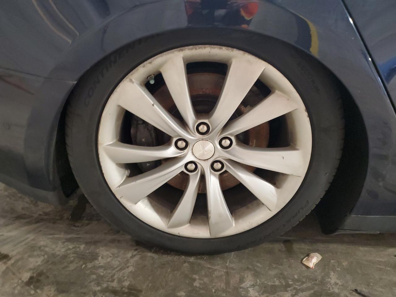 2015 Tesla Model S 85d Blue vin: 5YJSA1H26FFP74829 Damage: Right Rear Wheel, Curb Rash, > 12 Inches