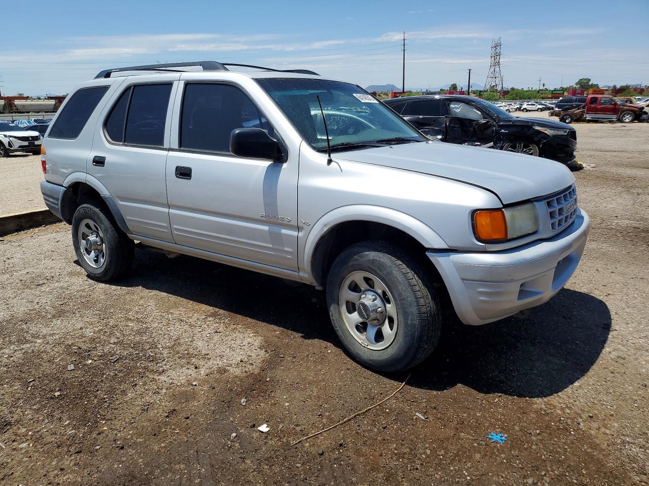 1998 Isuzu Rodeo S Silver vin: 4S2CK58W9W4306956