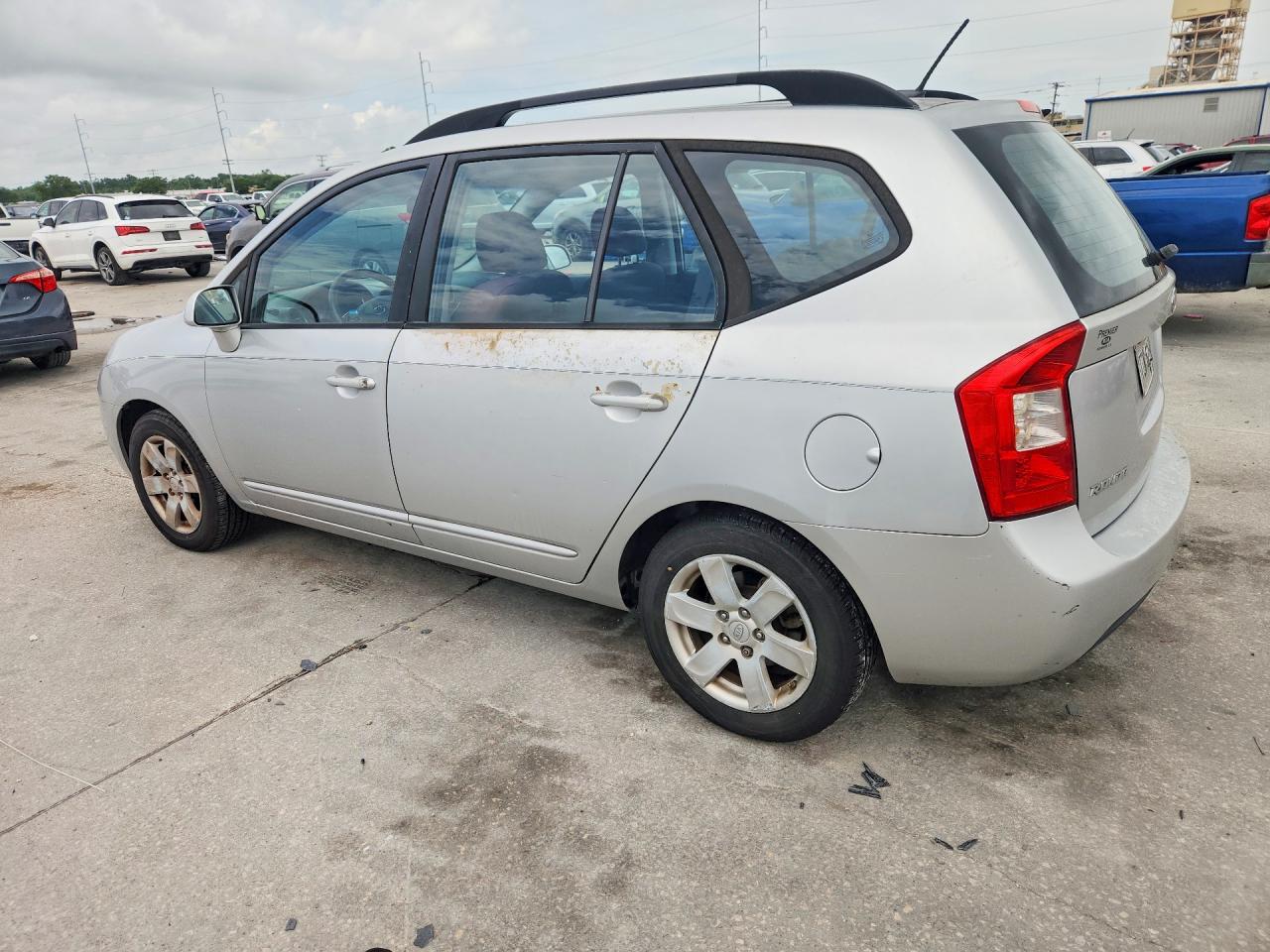 2009 Kia Rondo Base Серебряный vin: KNAFG528797271788