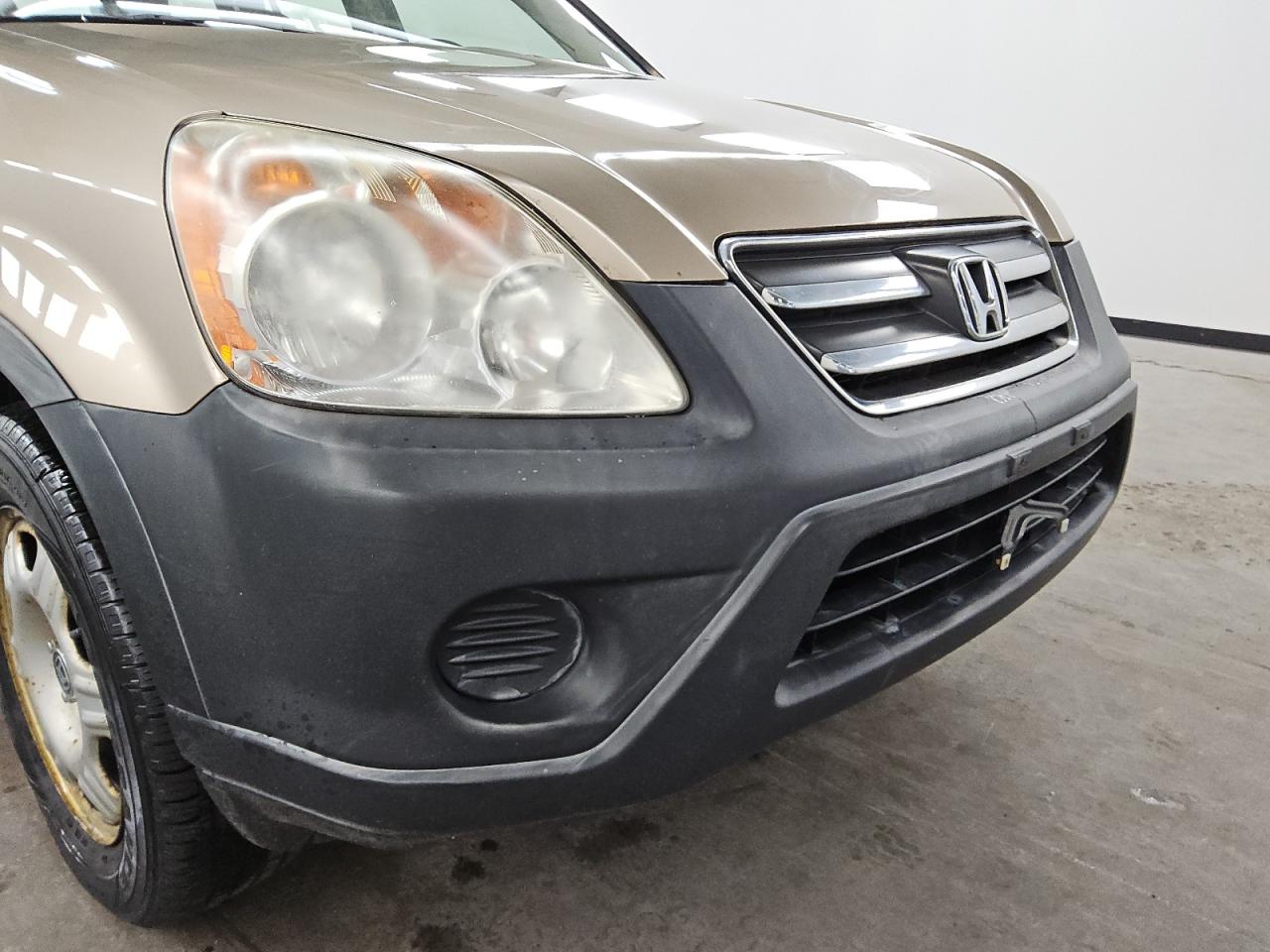 2006 Honda Cr-v Lx Gold vin: JHLRD785X6C002014 Damage: Front Bumper/Cover, Replaced, Substandard Repair