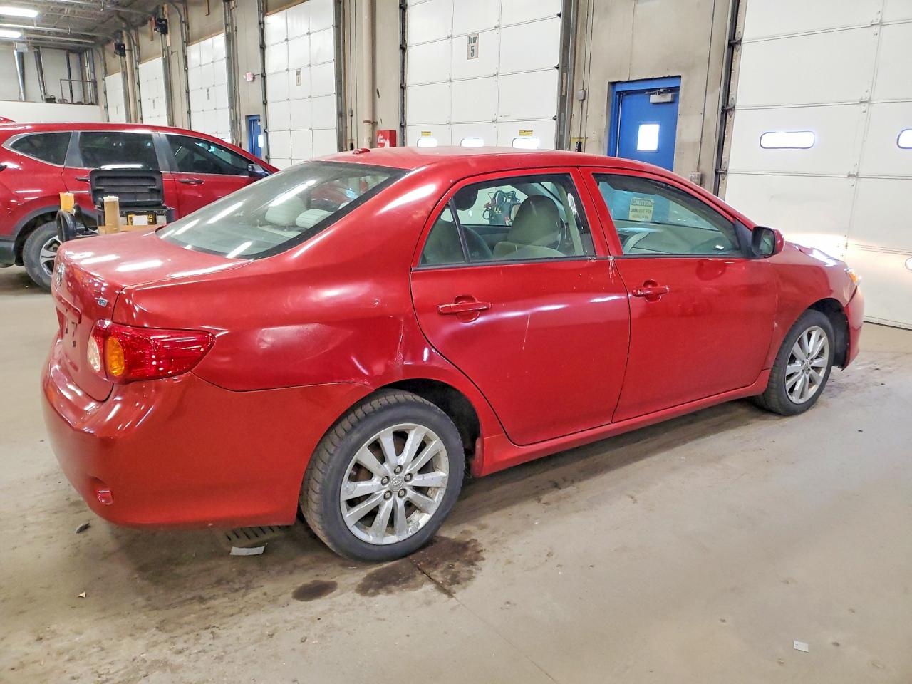 2009 Toyota Corolla Le Red vin: 2T1BU40E99C043237