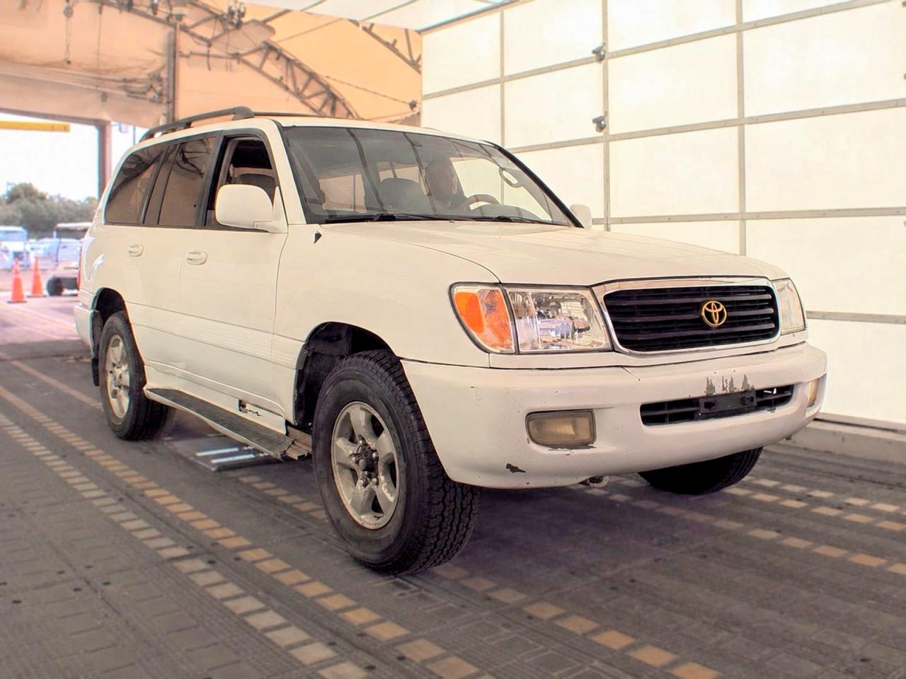 2000 Toyota Land Cruiser Base White vin: JT3HT05J4Y0113106