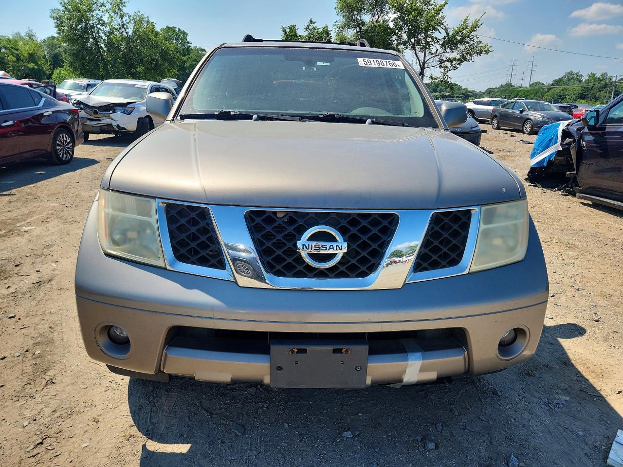 2005 Niss Pathfinder Tan vin: 5N1AR18W35C768484